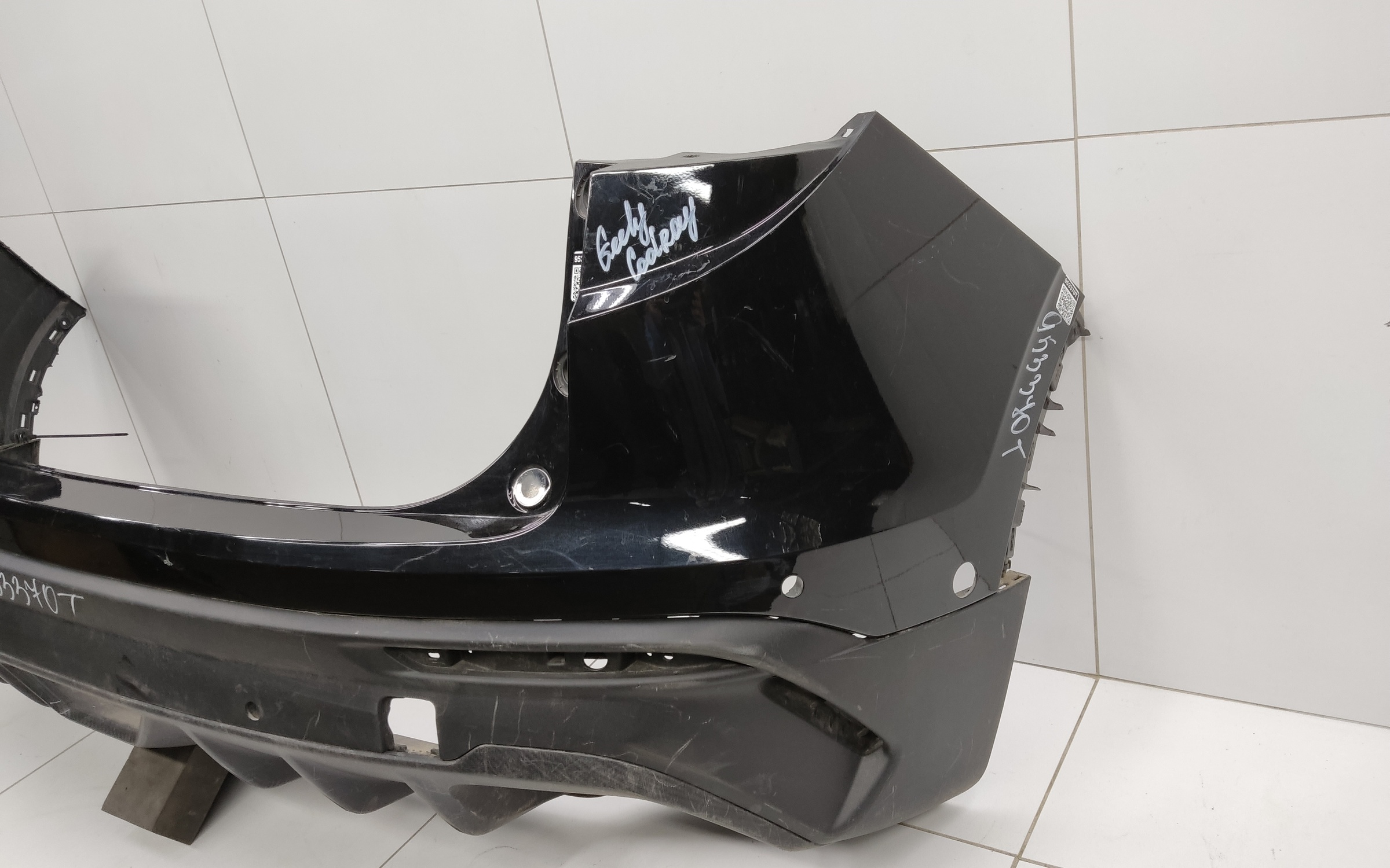 Бампер задний верхняя часть Geely Coolray