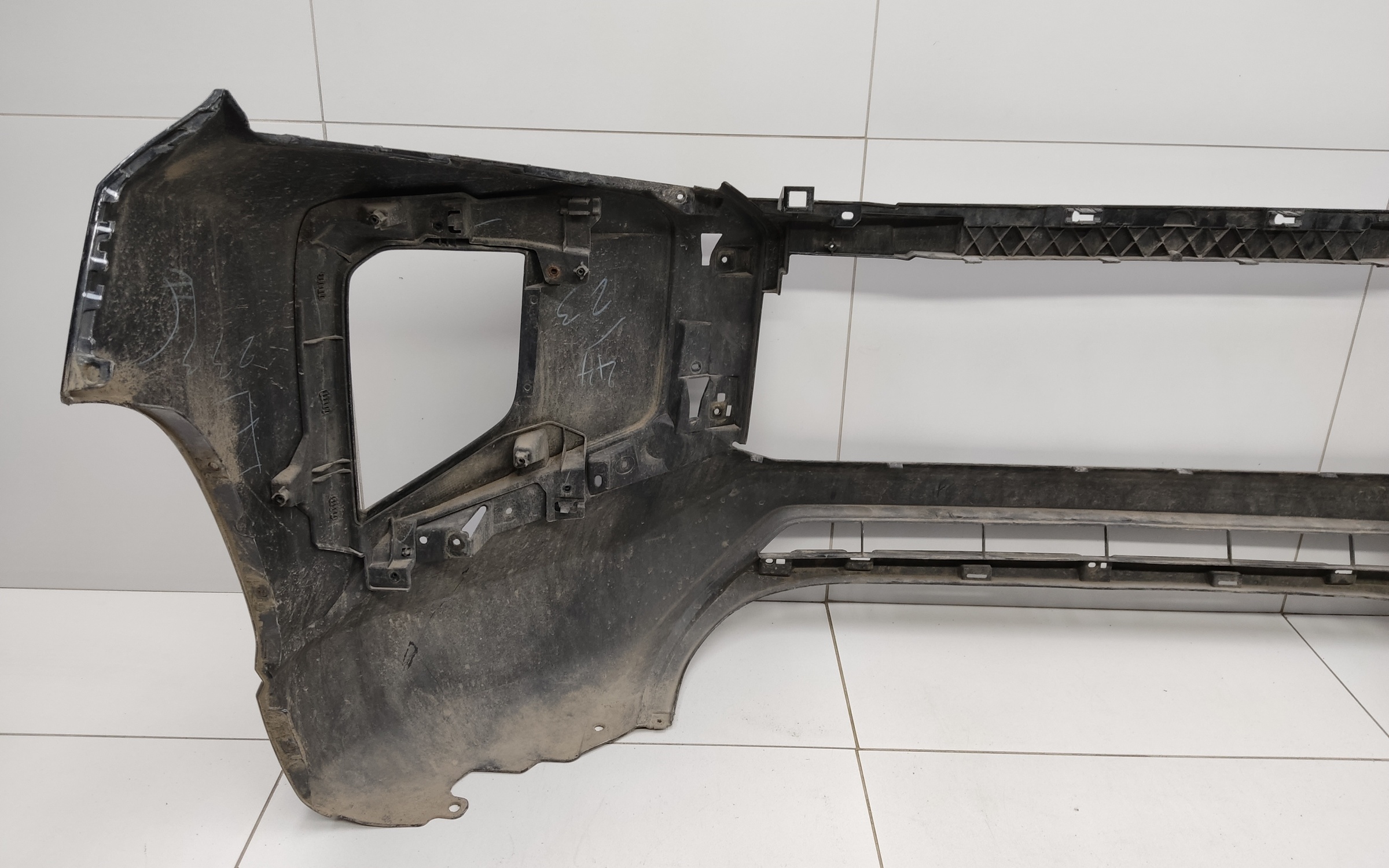 Бампер передний Mitsubishi L200 5 Restail
