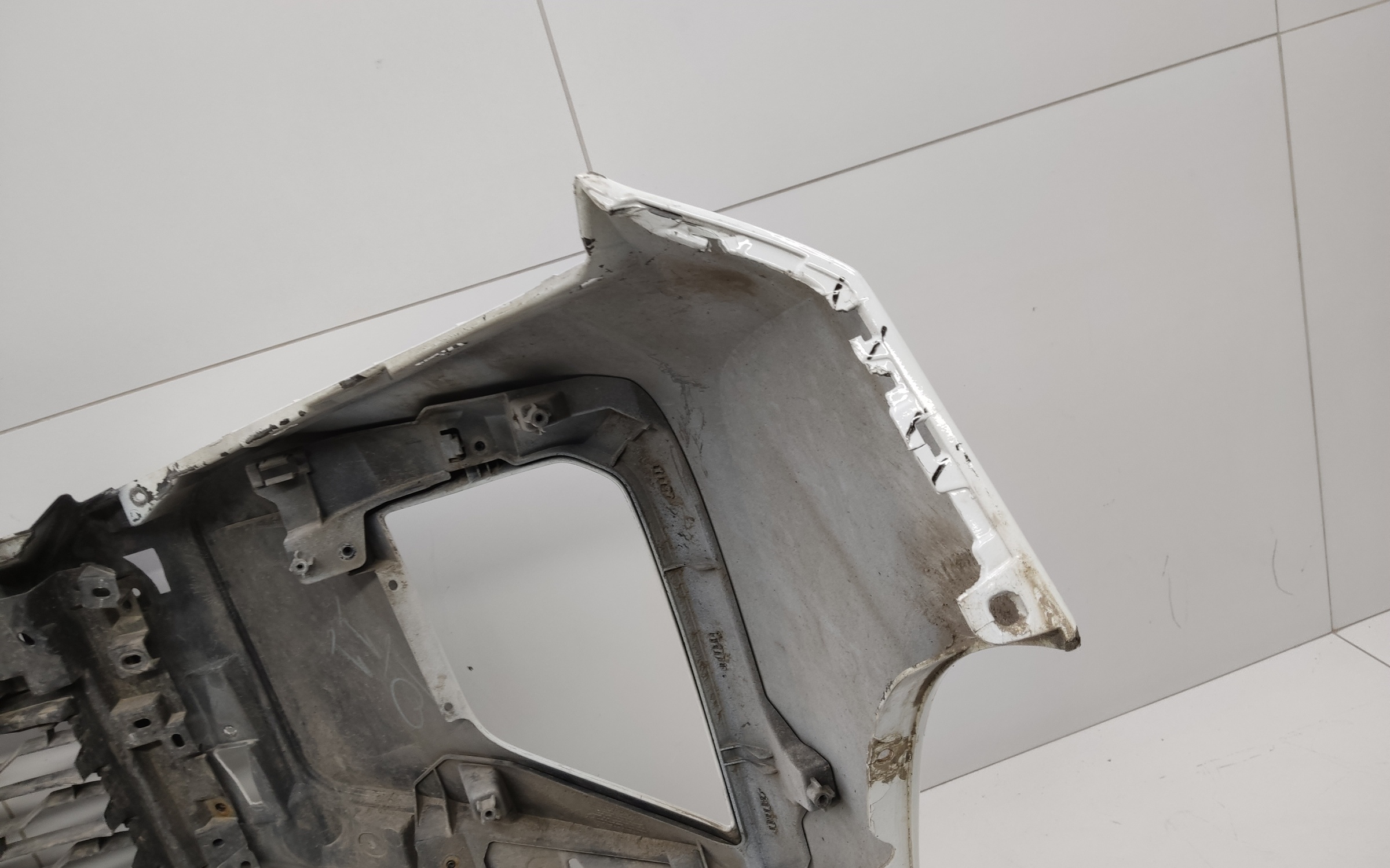 Бампер передний Mitsubishi L200 5 Restail