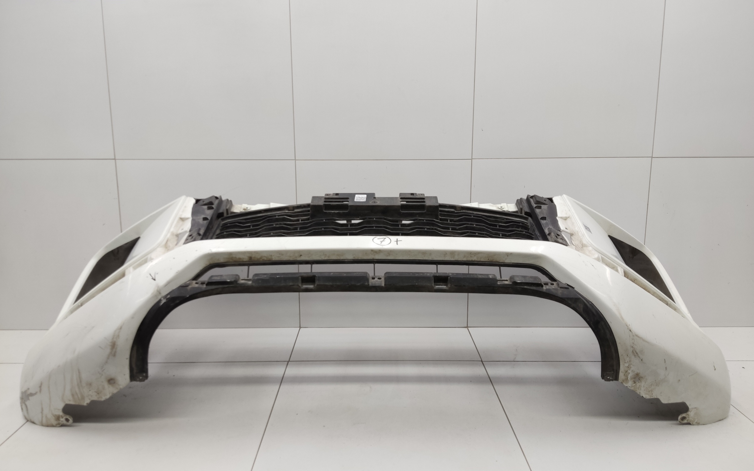 Бампер передний Mitsubishi L200 5 Restail