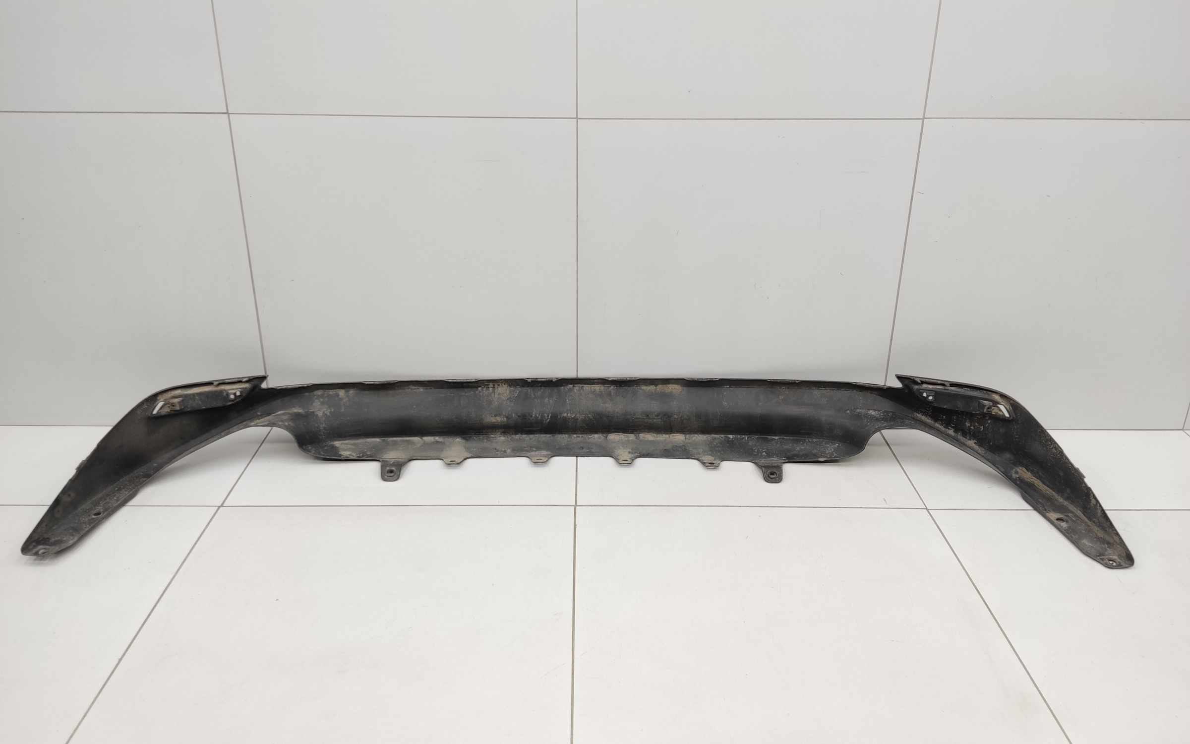 Юбка заднего бампера Toyota Camry V70