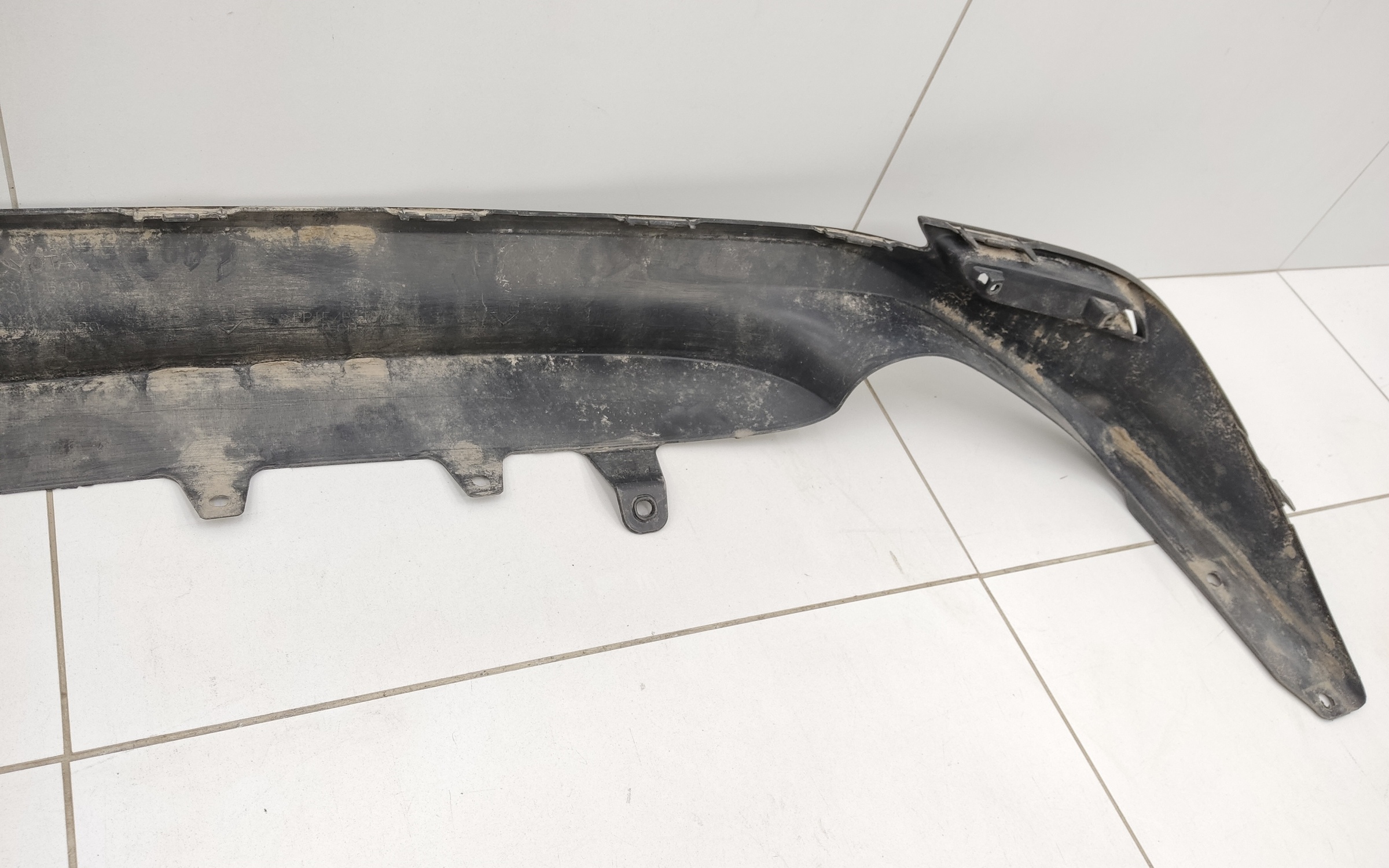 Юбка заднего бампера Toyota Camry V70