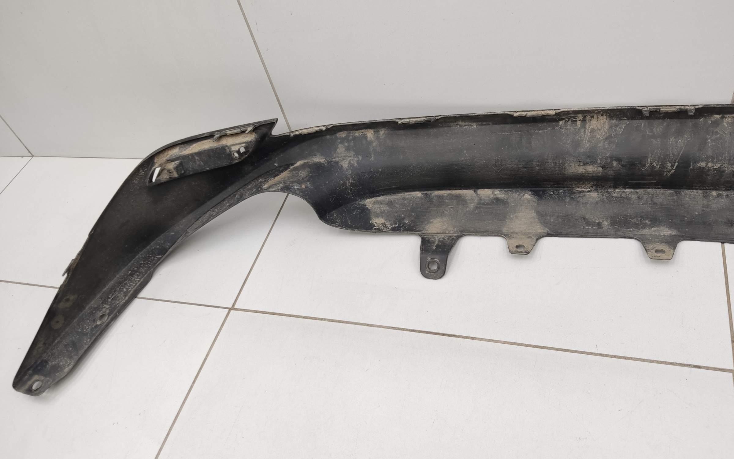 Юбка заднего бампера Toyota Camry V70