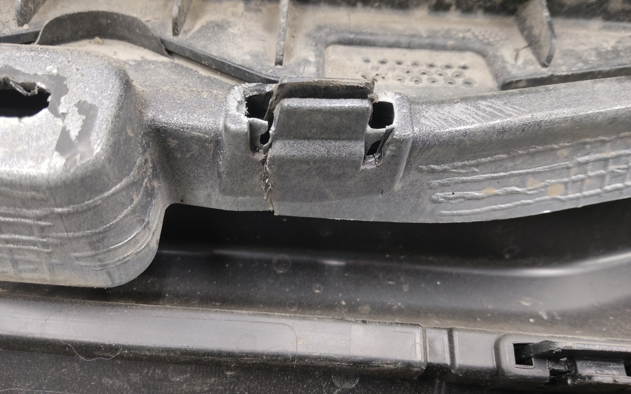 Бампер задний Geely Atlas 2