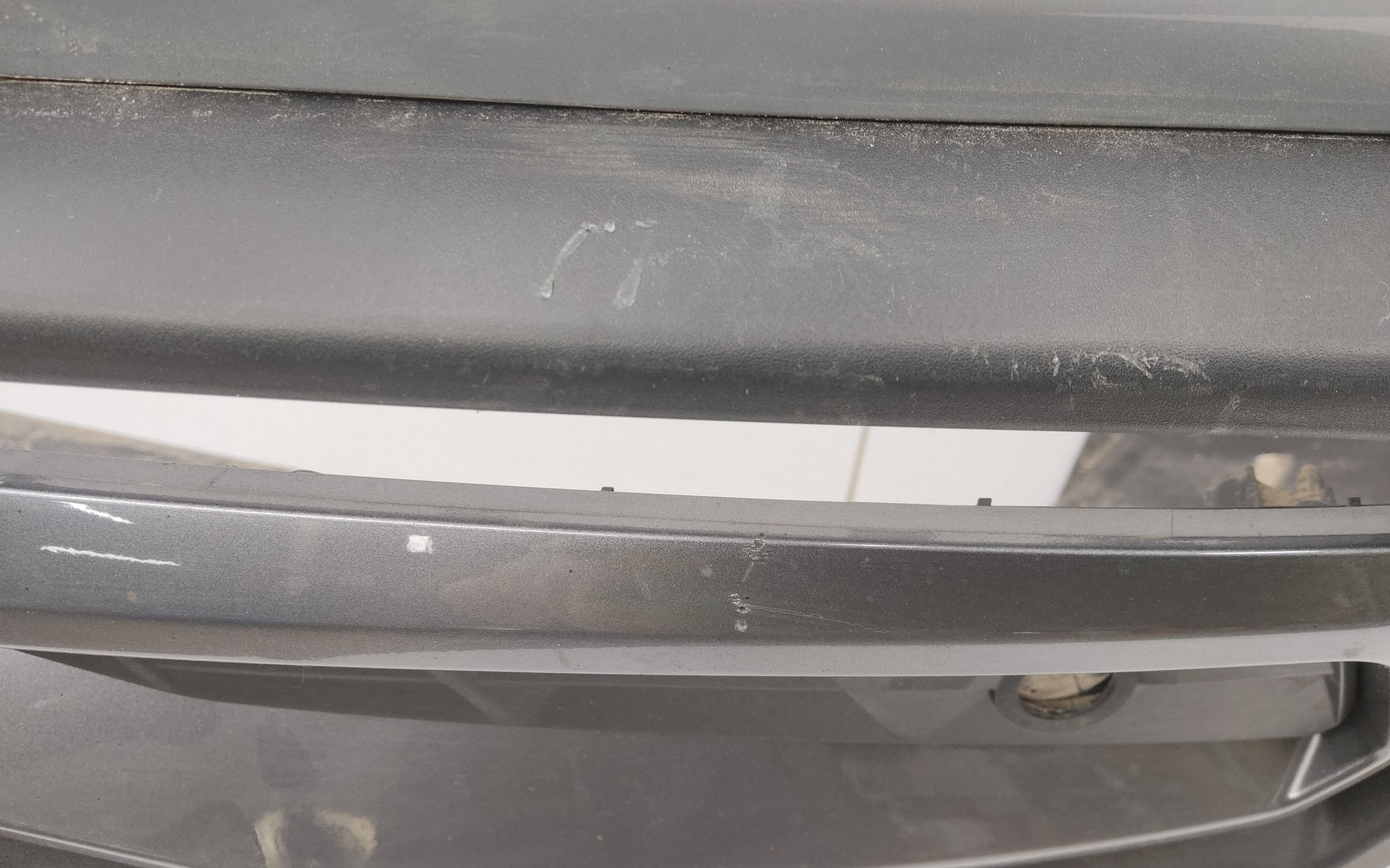 Бампер задний Geely Atlas 2