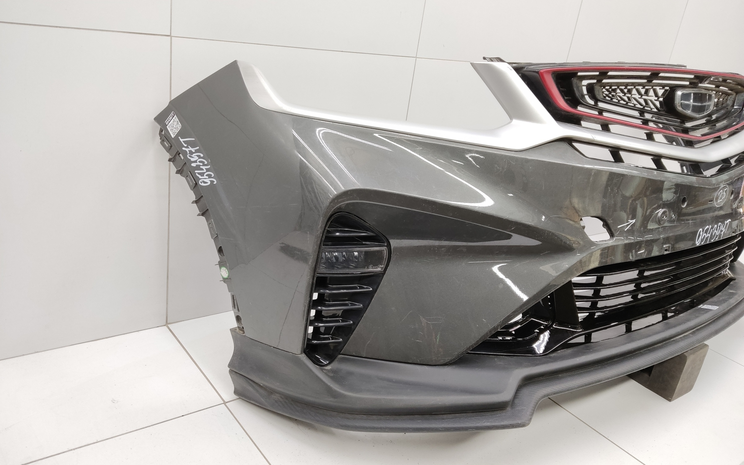 Бампер передний Geely Coolray без парктроников