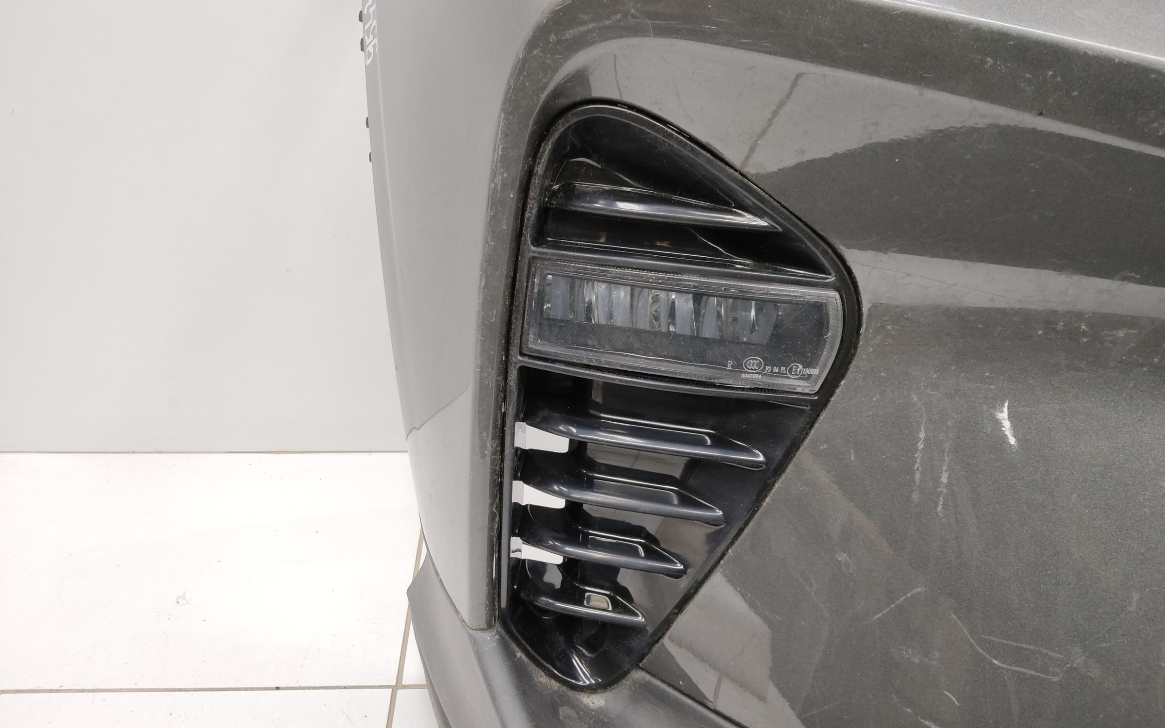 Бампер передний Geely Coolray без парктроников