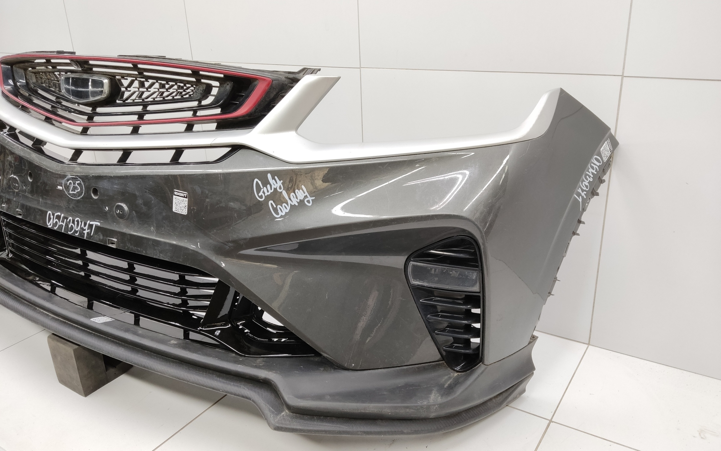 Бампер передний Geely Coolray без парктроников