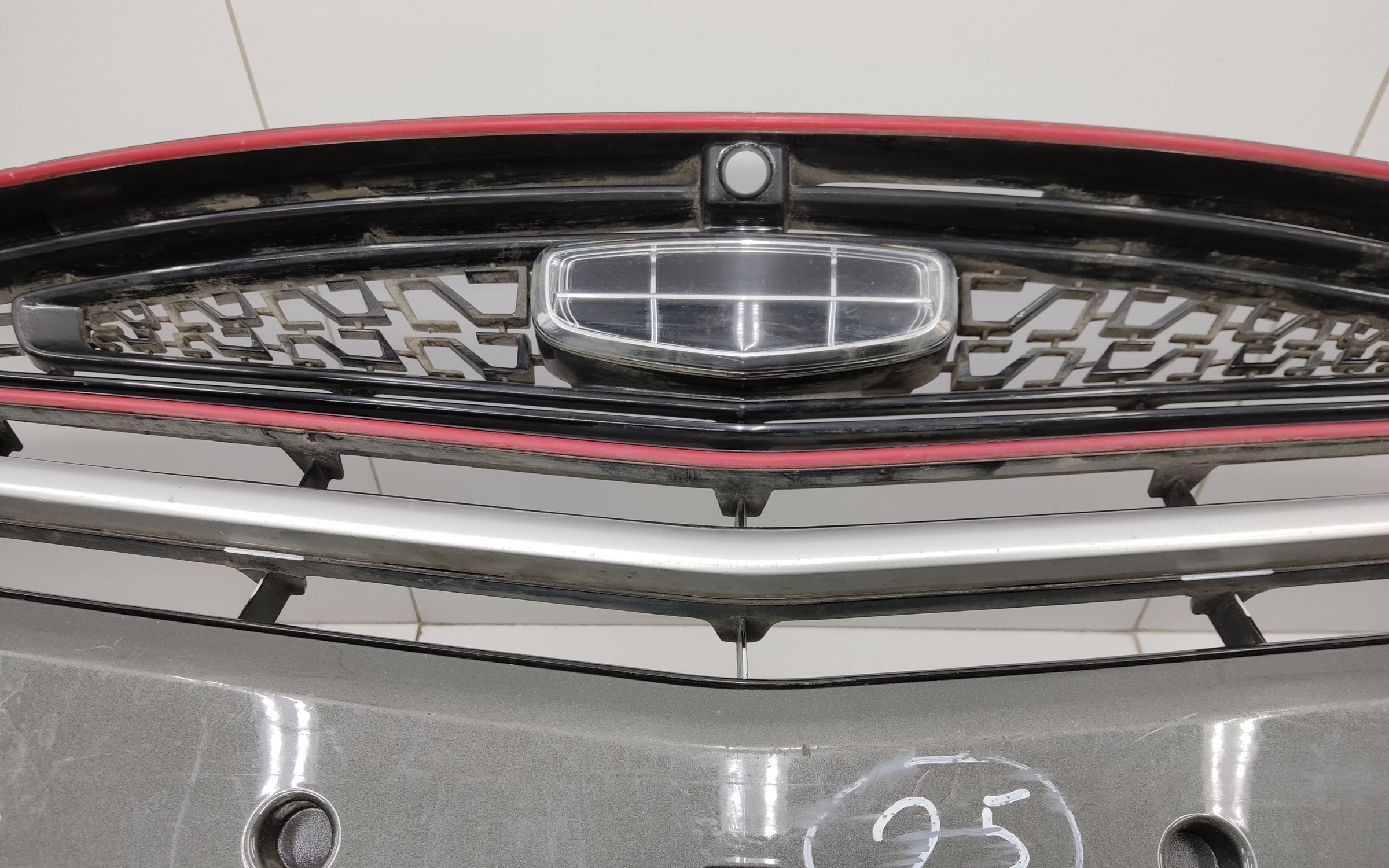 Бампер передний Geely Coolray без парктроников