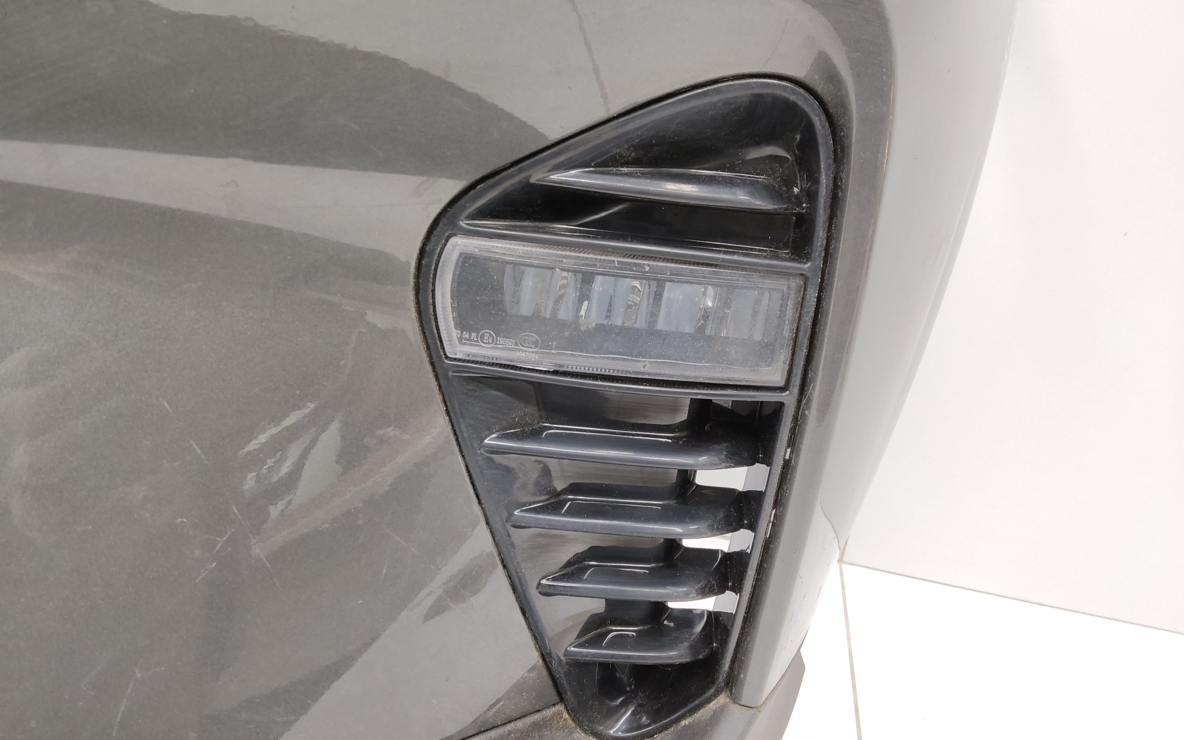 Бампер передний Geely Coolray без парктроников