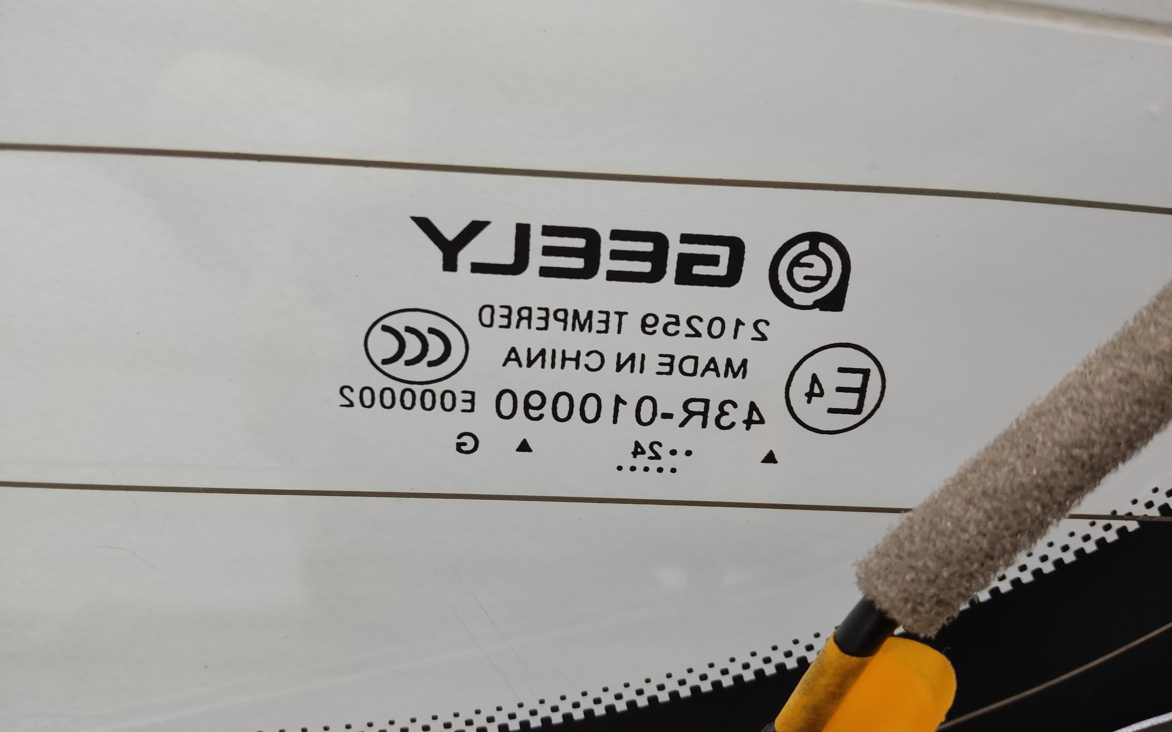 Стекло крышки багажника Geely Atlas 2