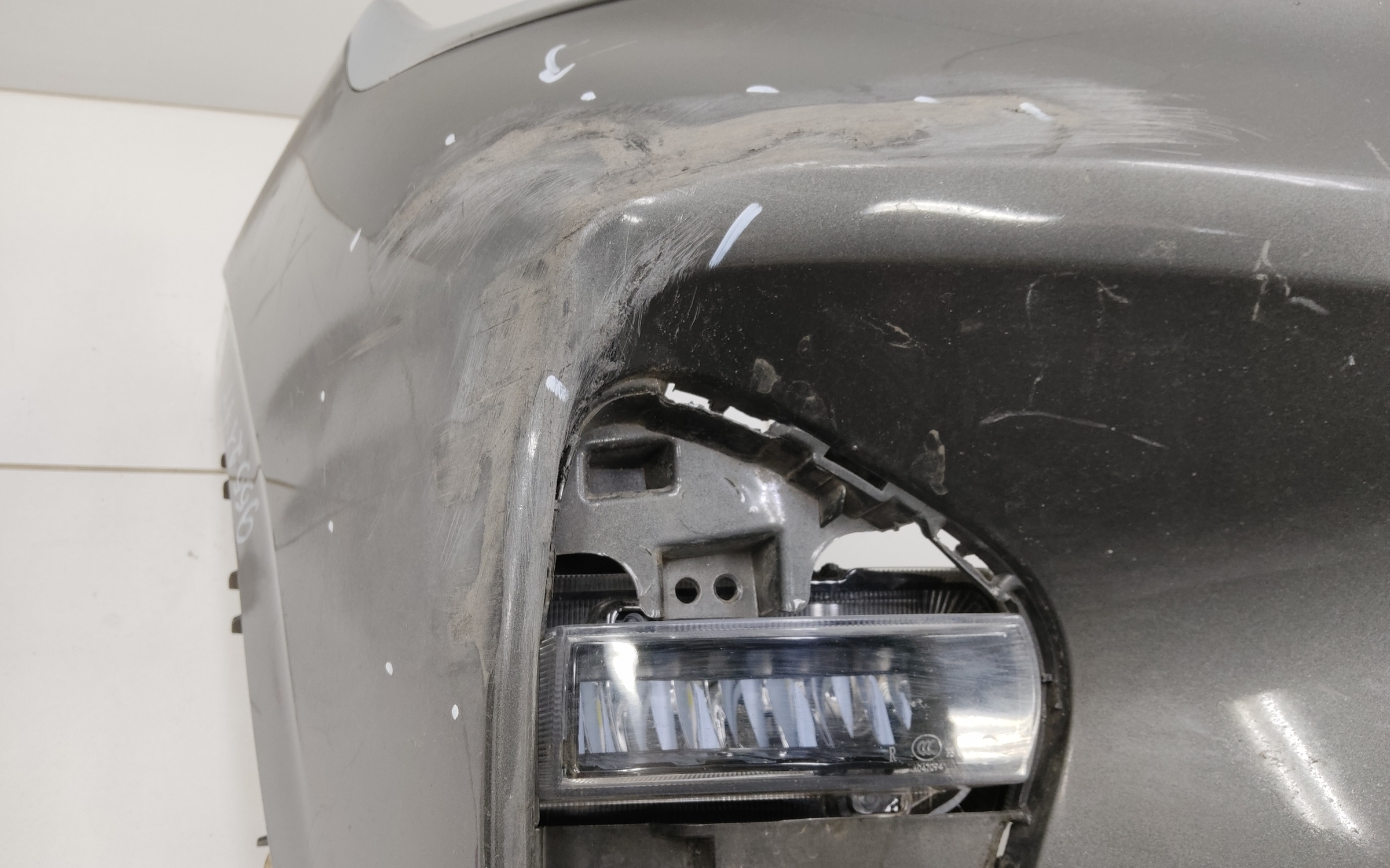 Бампер передний Geely Coolray без парктроников