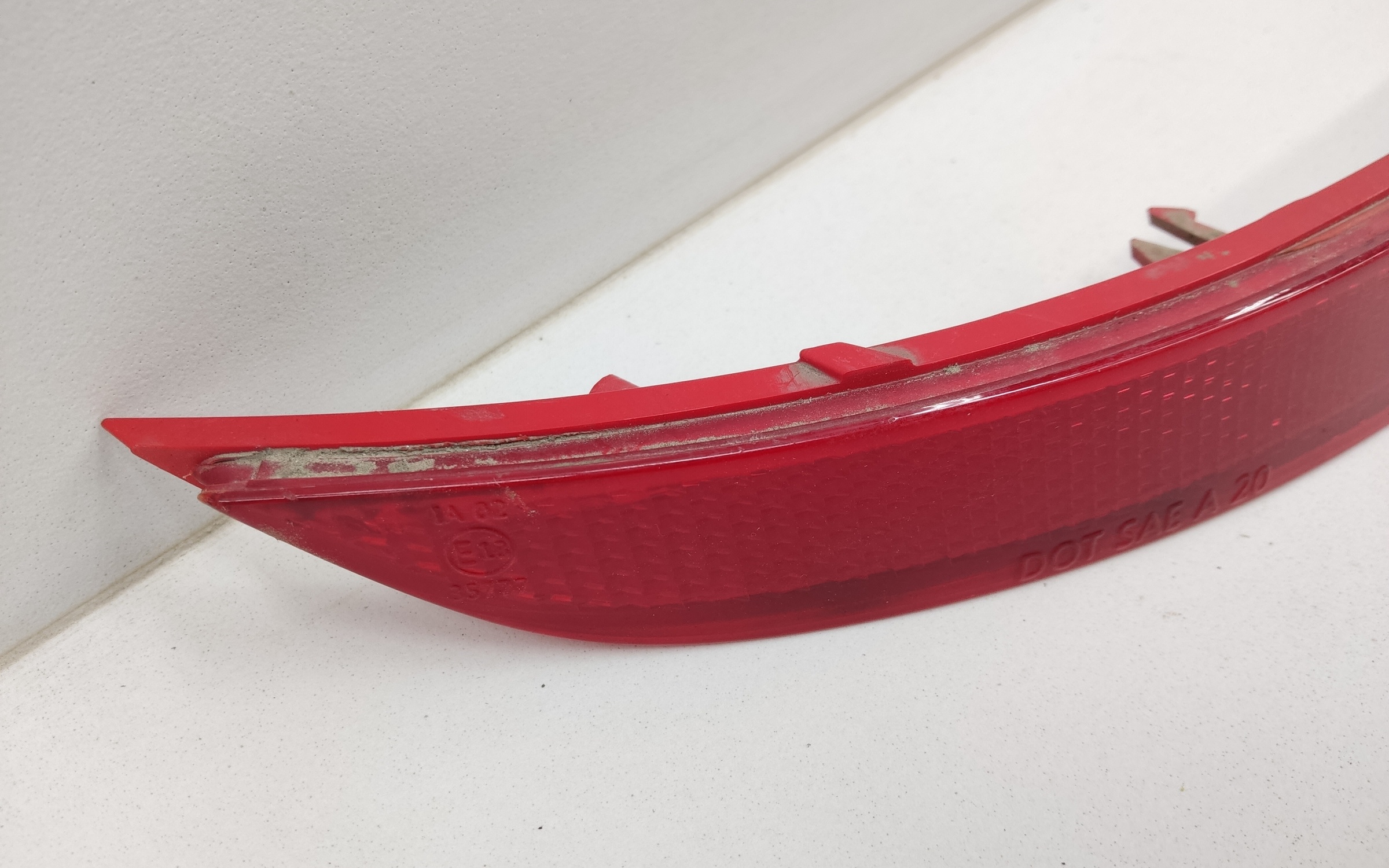 Светоотражатель заднего бампера левый Genesis GV80