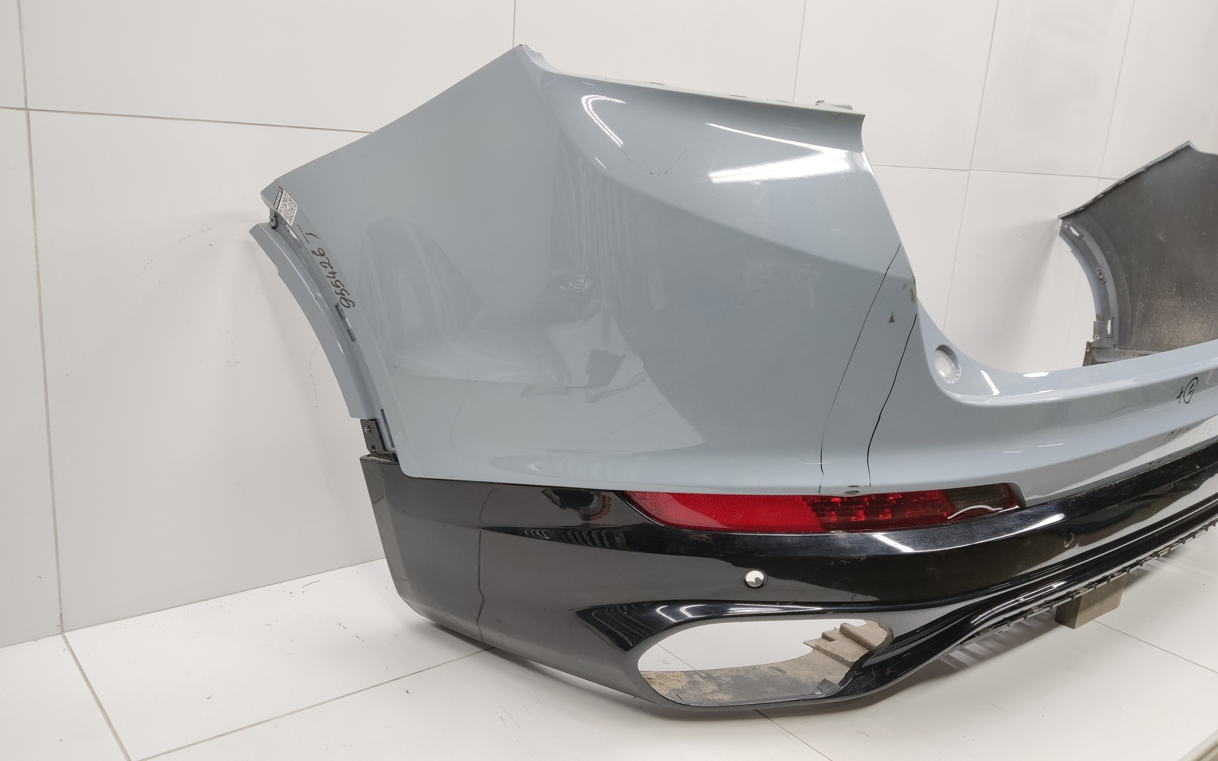 Бампер задний верхняя часть Geely Tugella