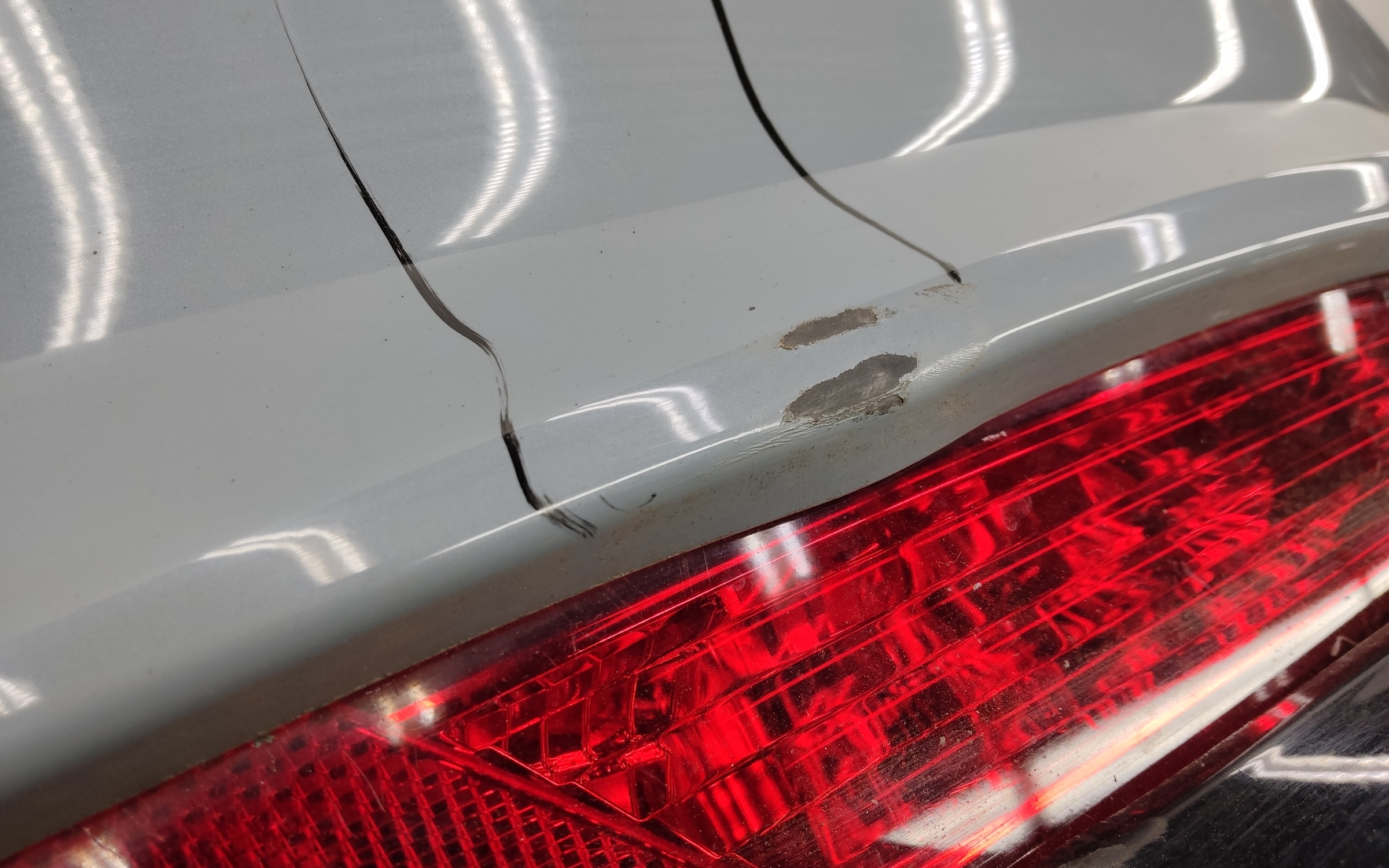 Бампер задний верхняя часть Geely Tugella