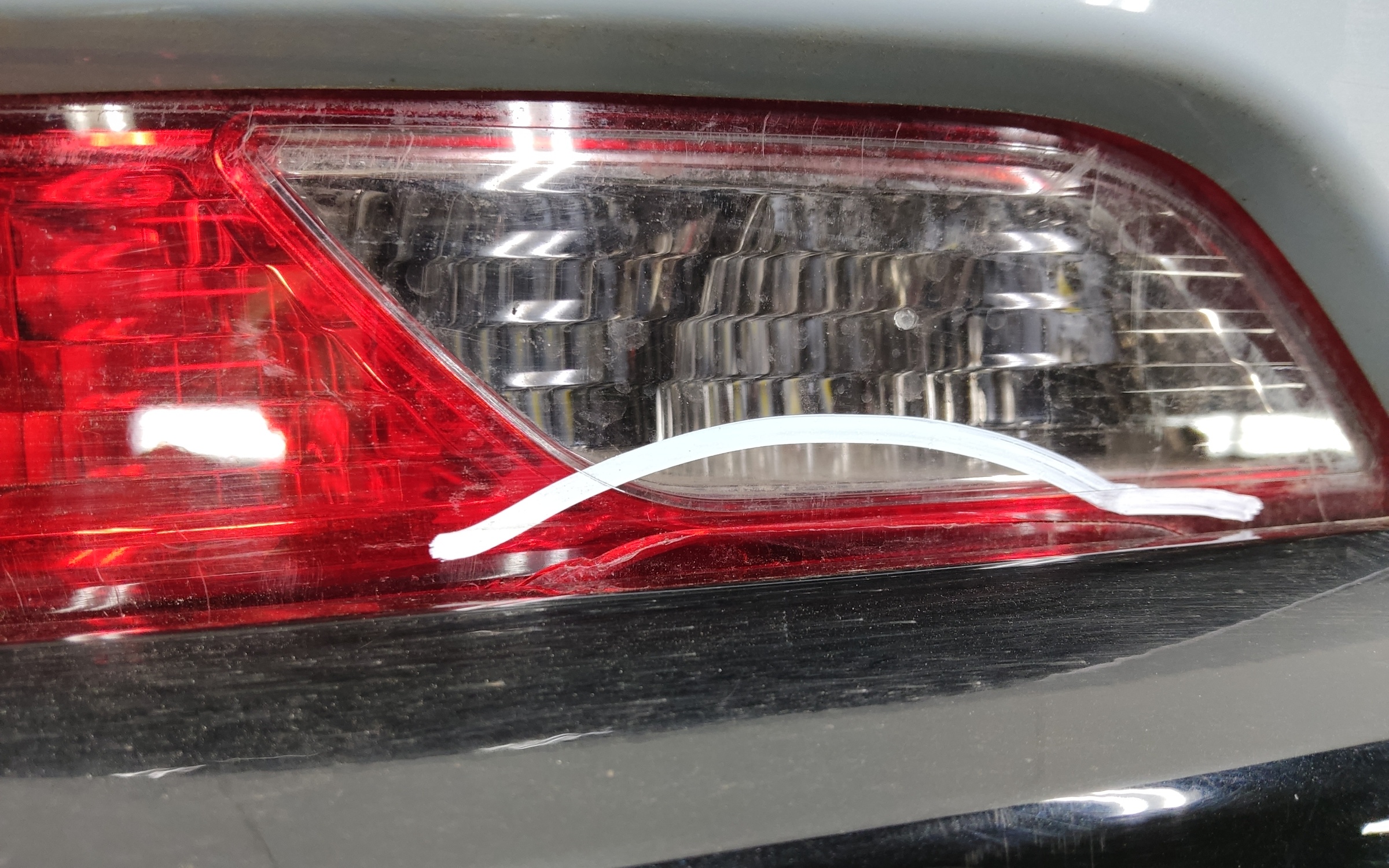 Бампер задний верхняя часть Geely Tugella