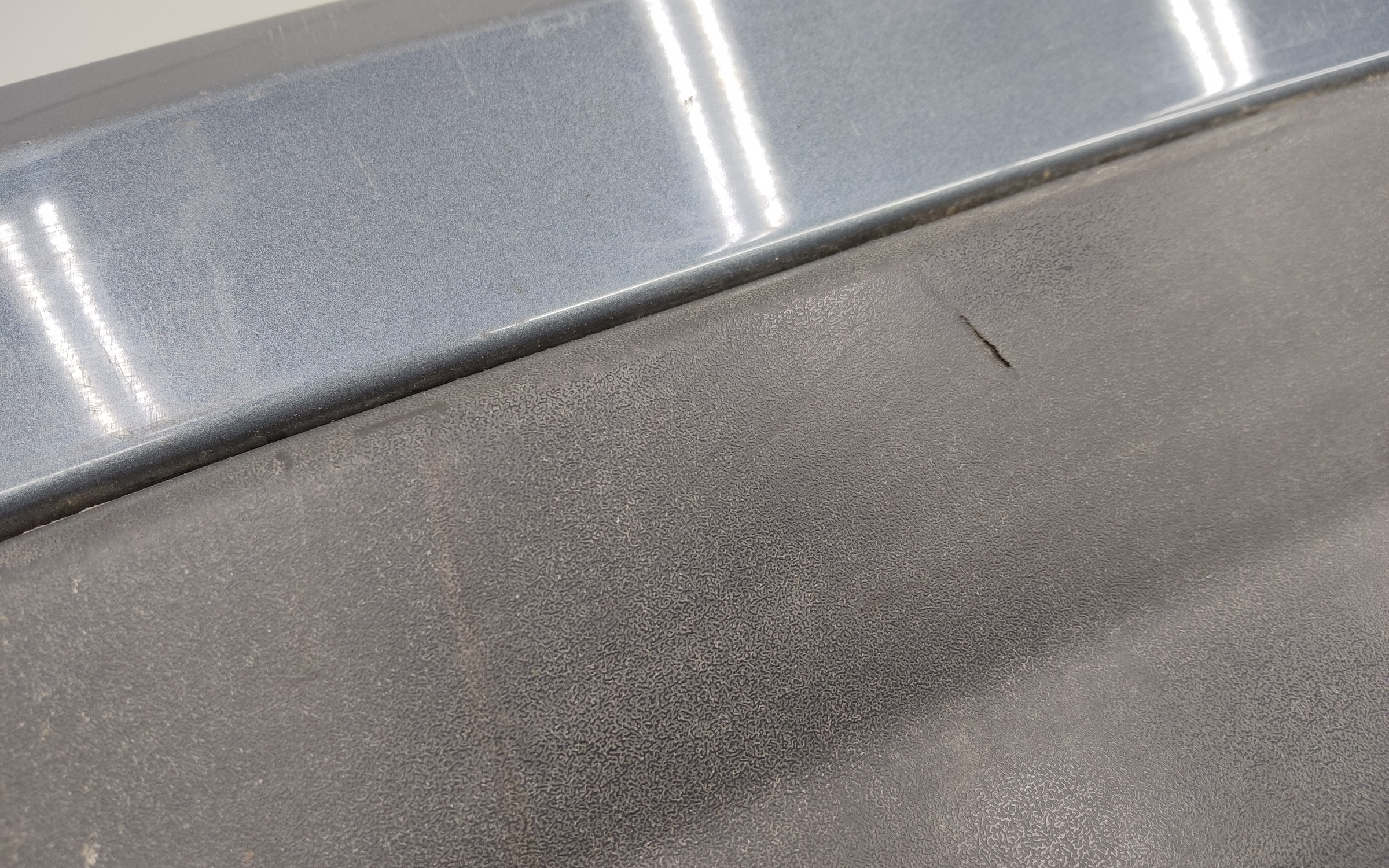 Бампер задний верхняя часть Geely Coolray