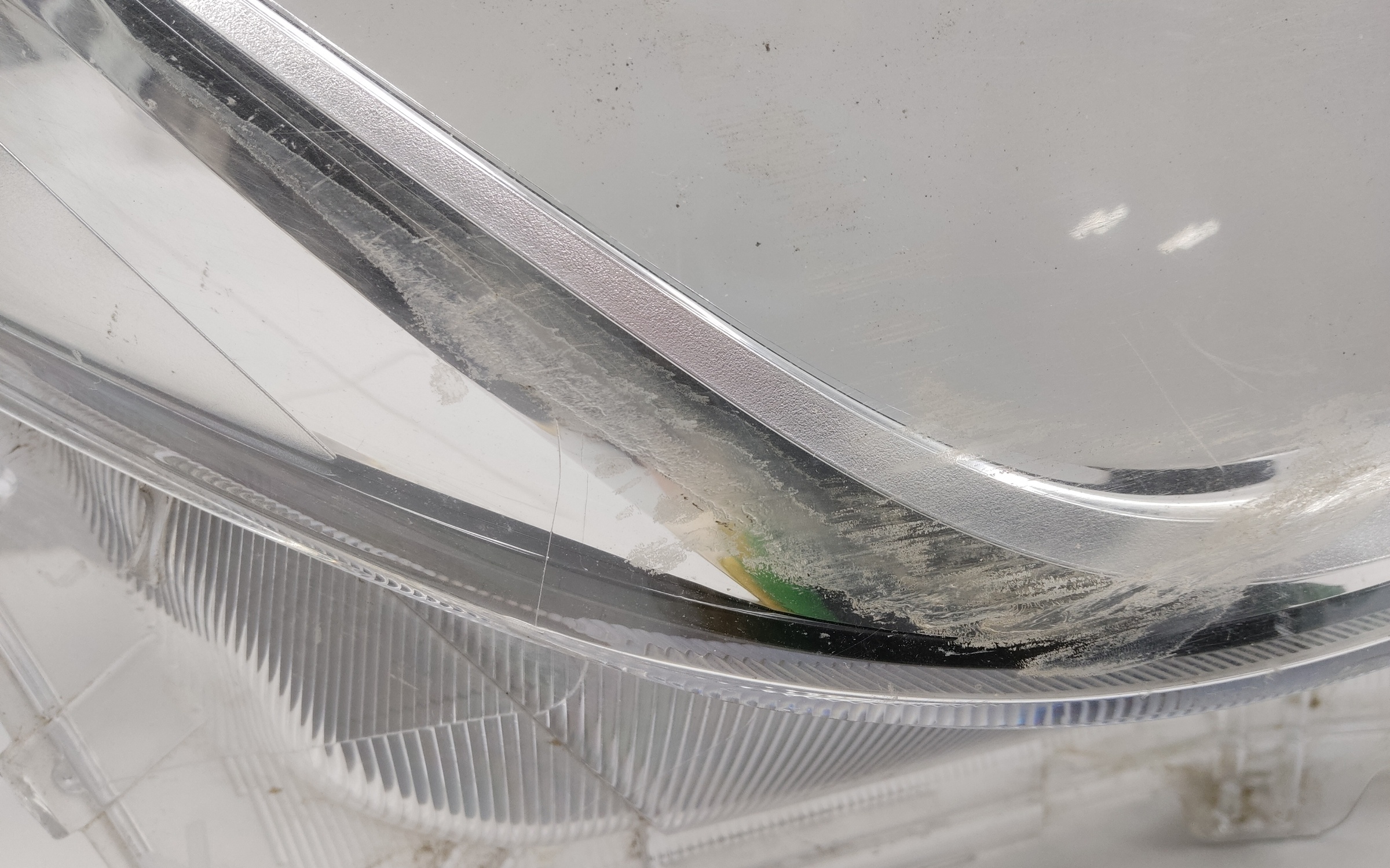 Стекло фары передней правой Toyota Corolla E210