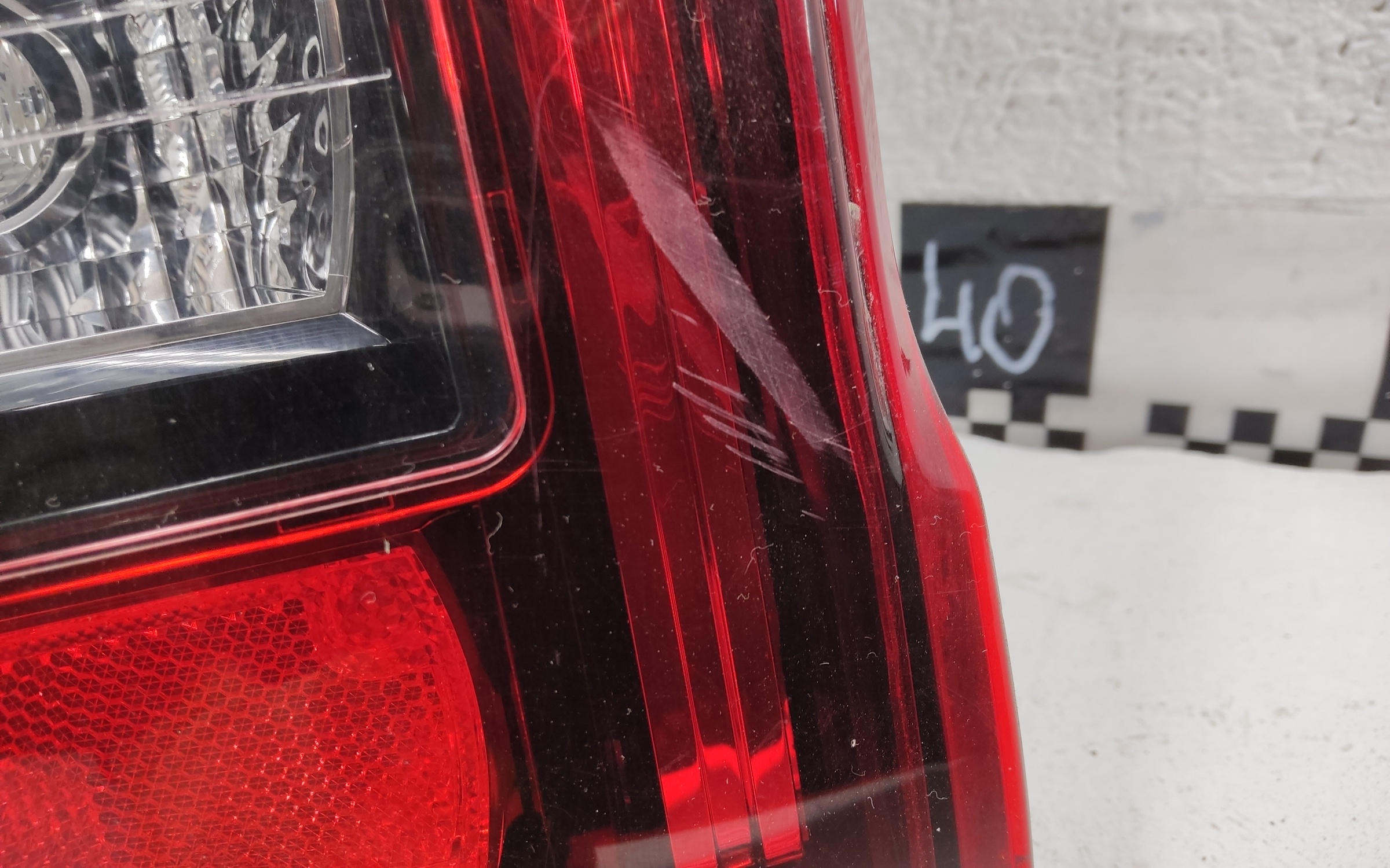 Фонарь задний левый Mitsubishi L200 5 Restail