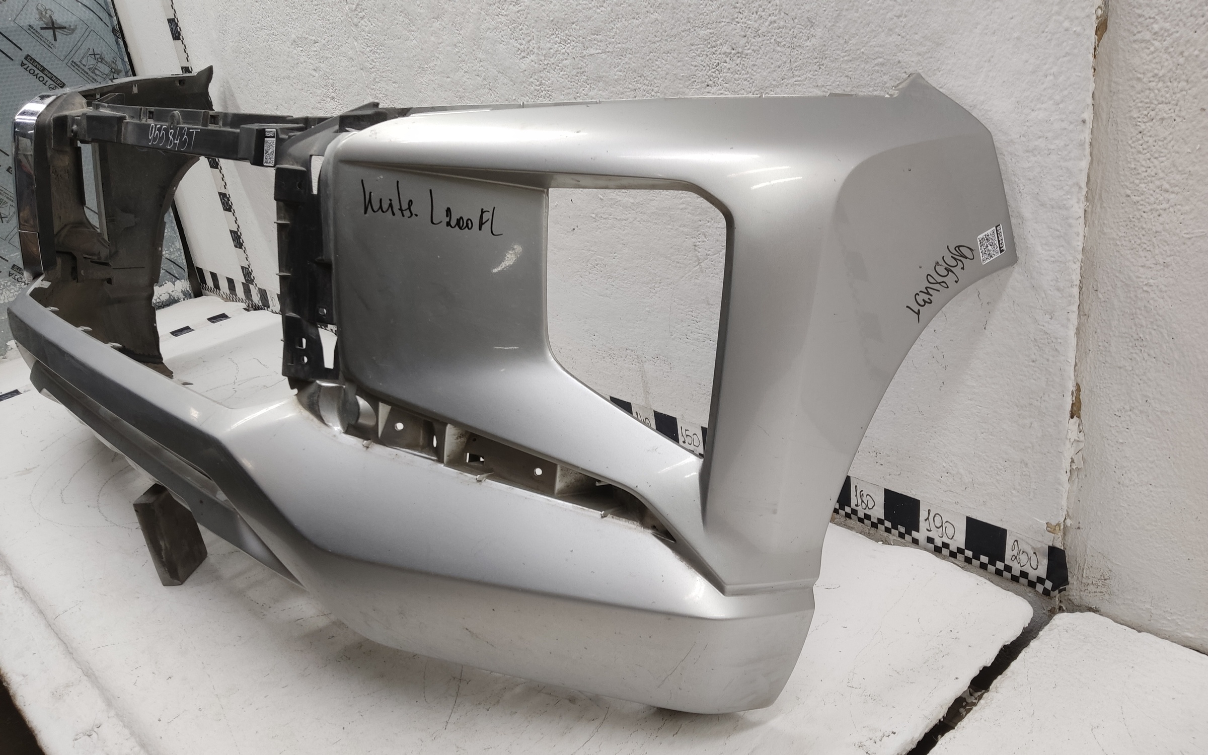 Бампер передний Mitsubishi L200 5 Restail