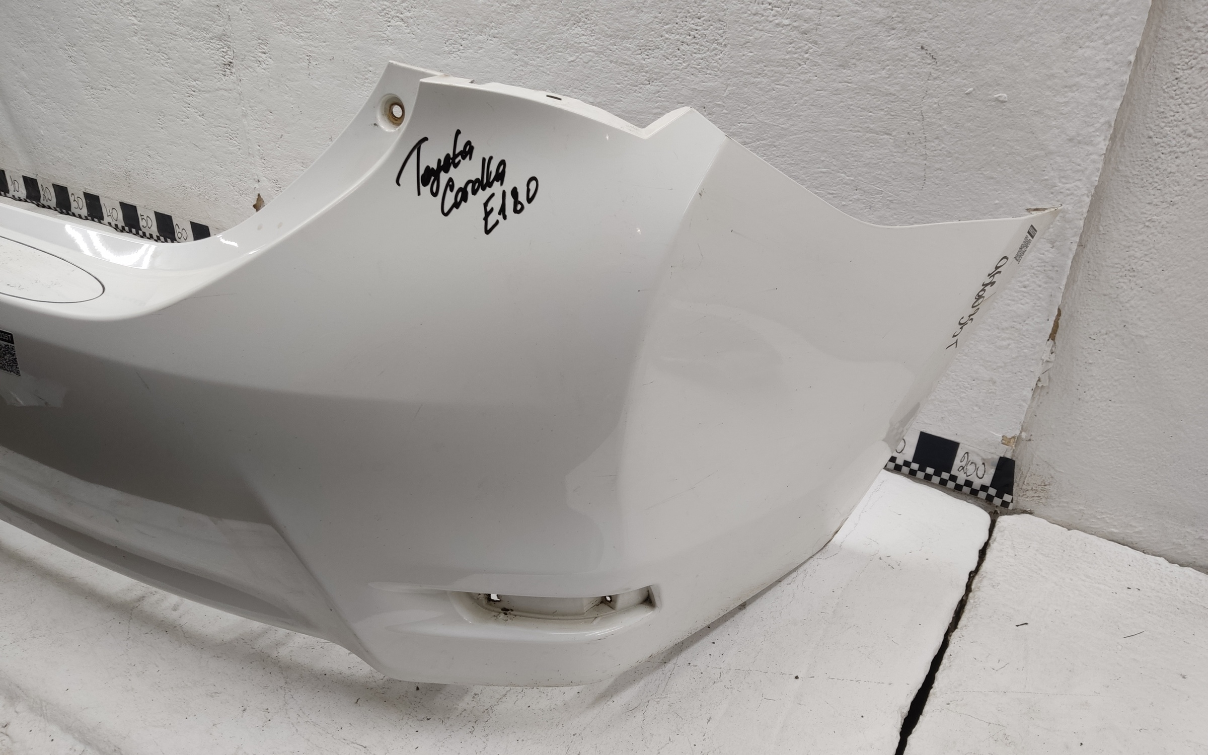 Бампер задний Toyota Corolla E180