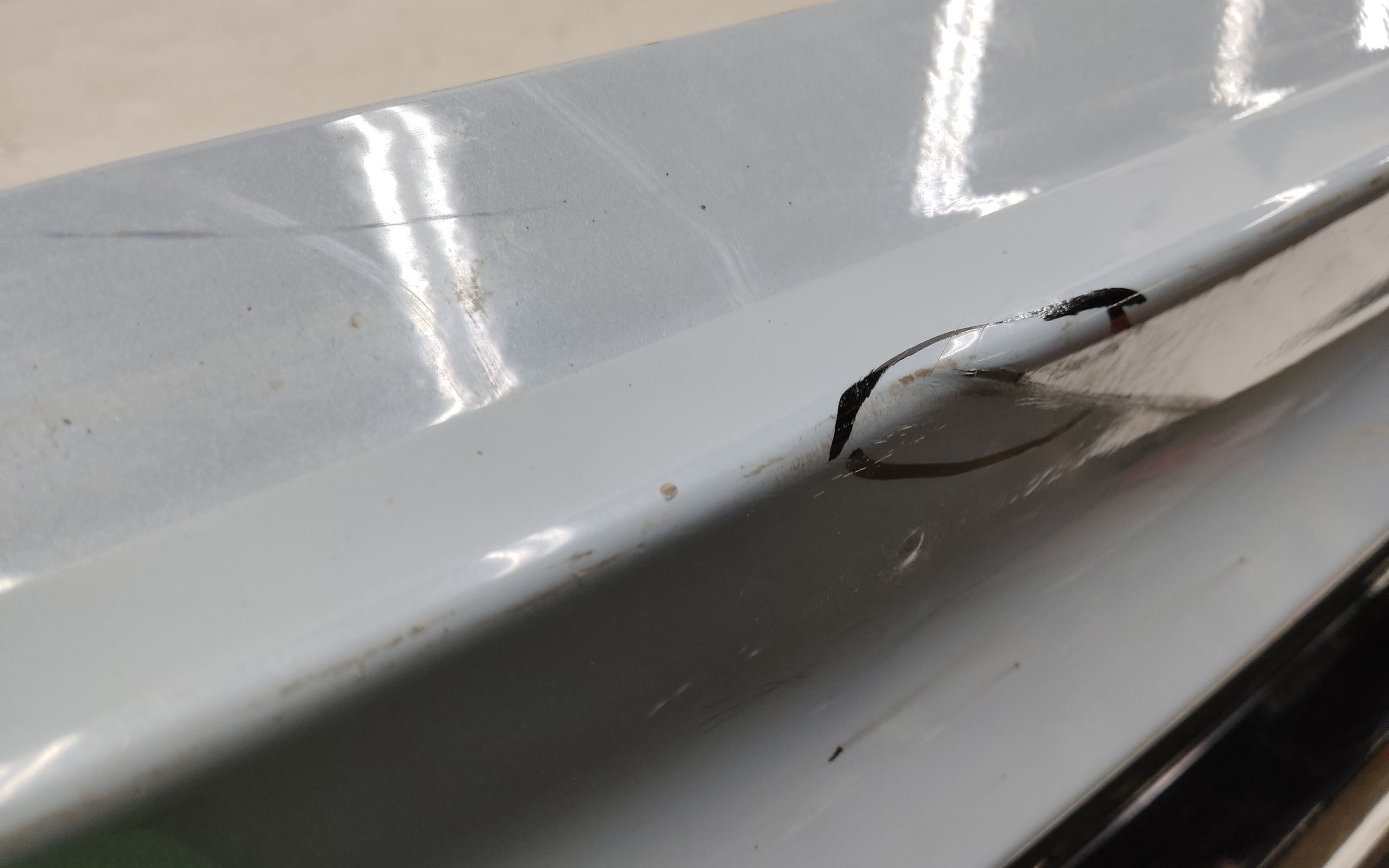 Бампер задний верхняя часть Geely Tugella