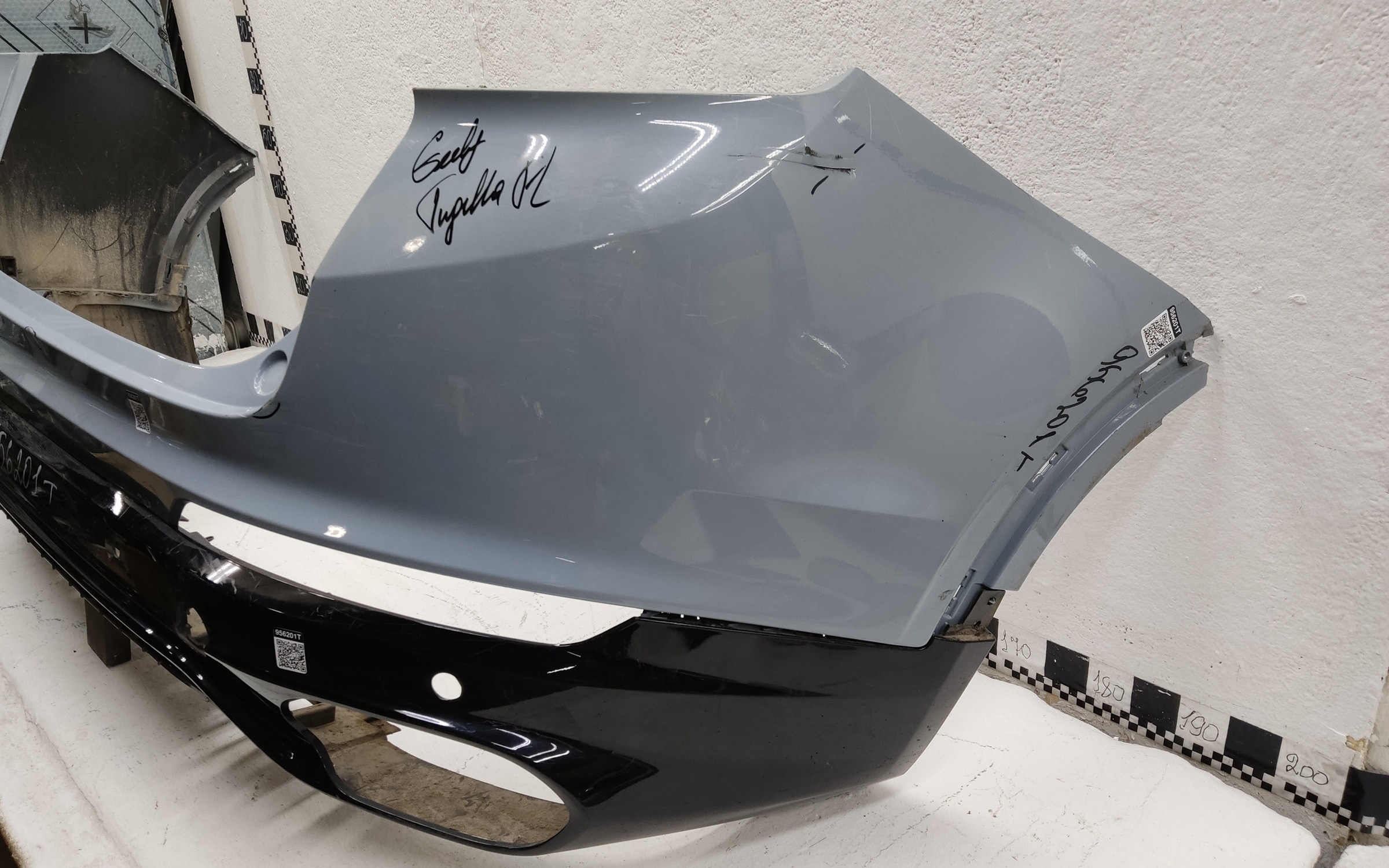 Бампер задний верхняя часть Geely Tugella