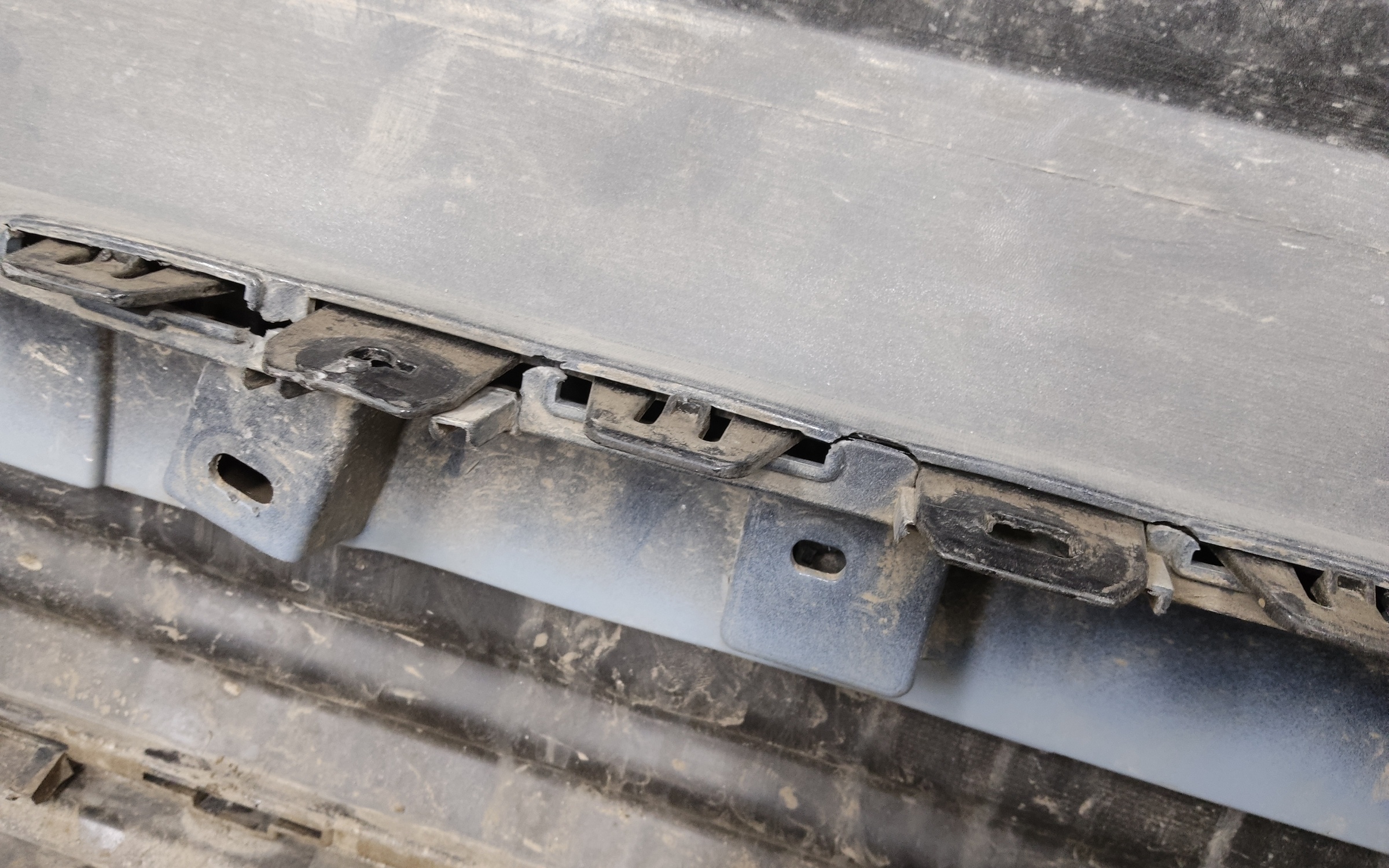 Бампер задний верхняя часть Geely Tugella