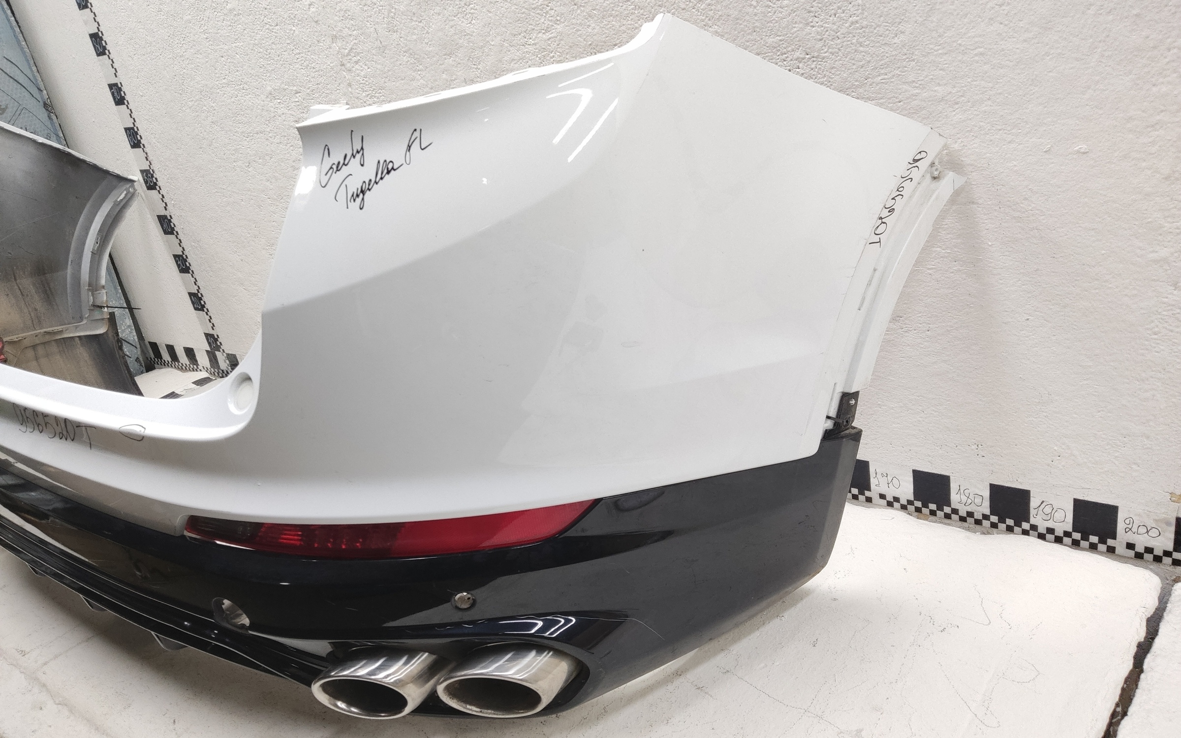 Бампер задний верхняя часть Geely Tugella