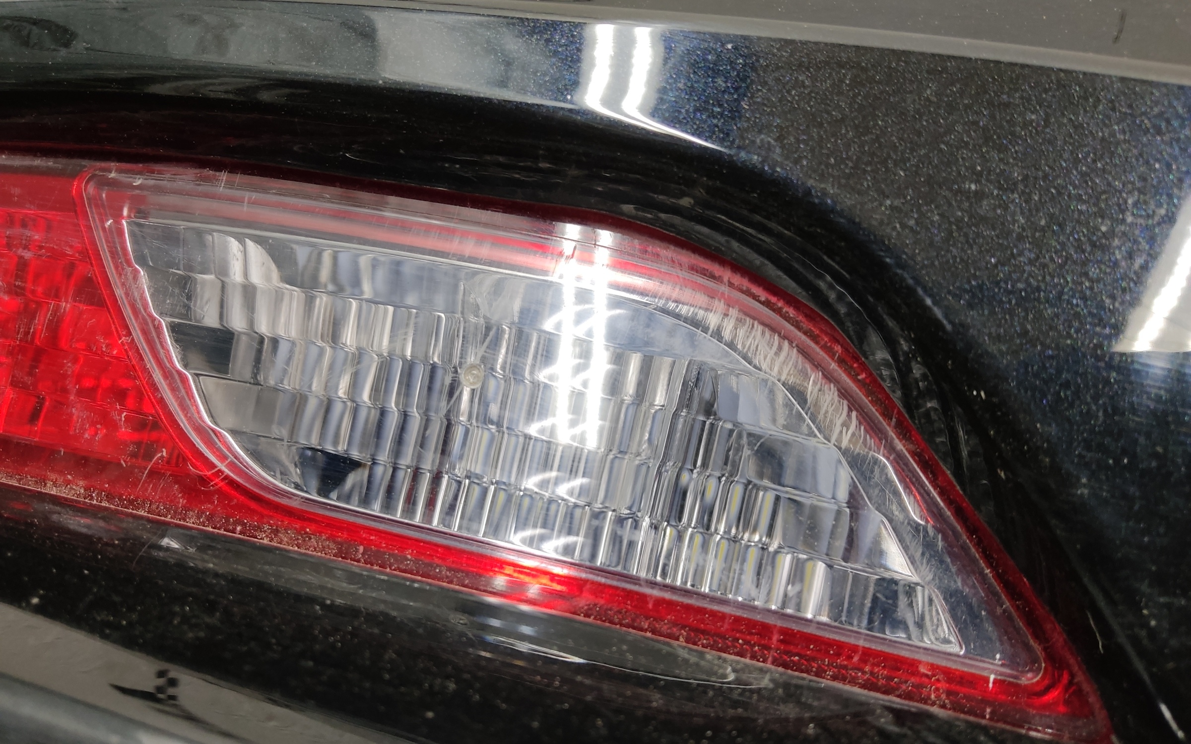 Бампер задний верхняя часть Geely Tugella