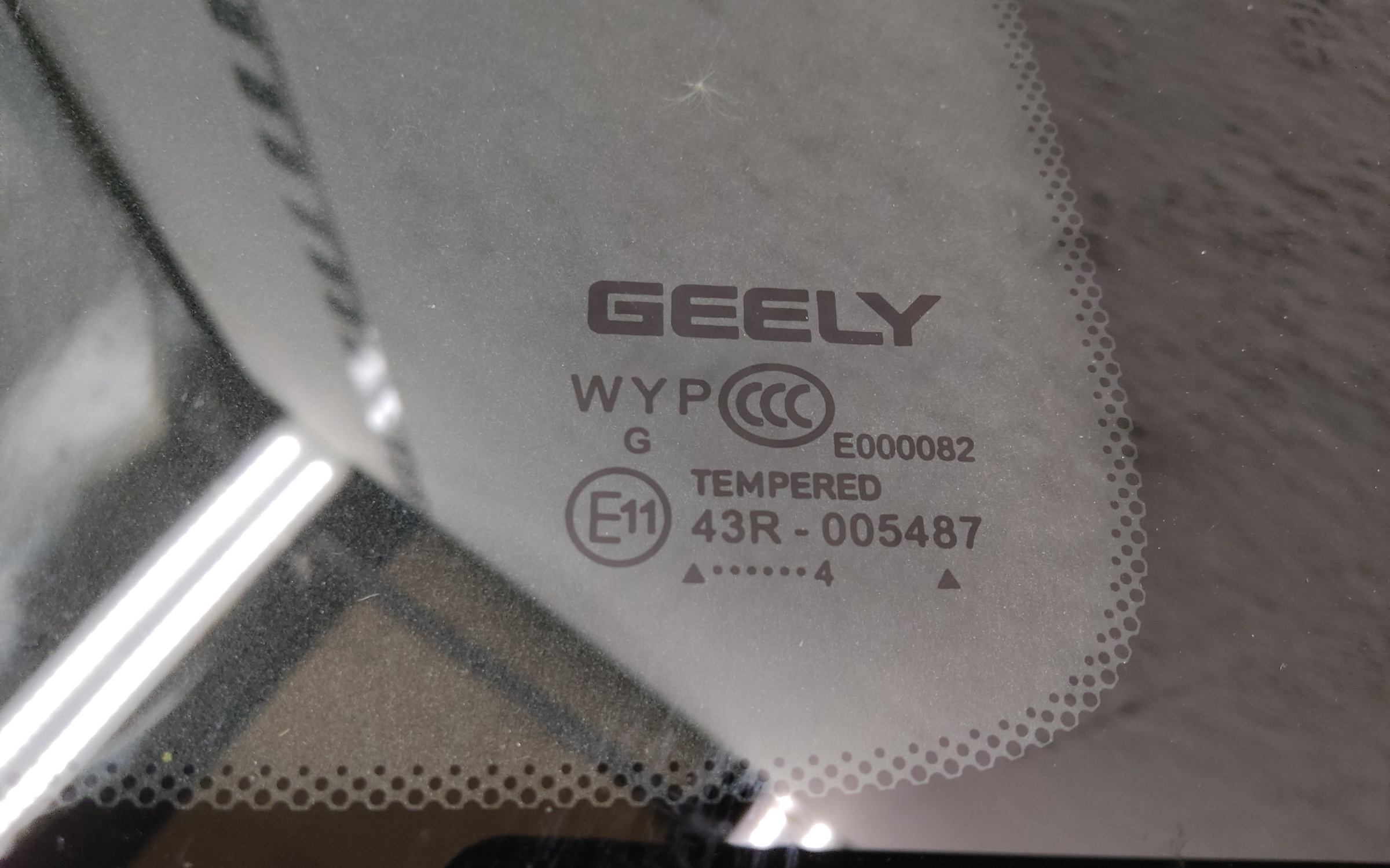 Стекло кузовное заднее левое Geely Okavango Restail