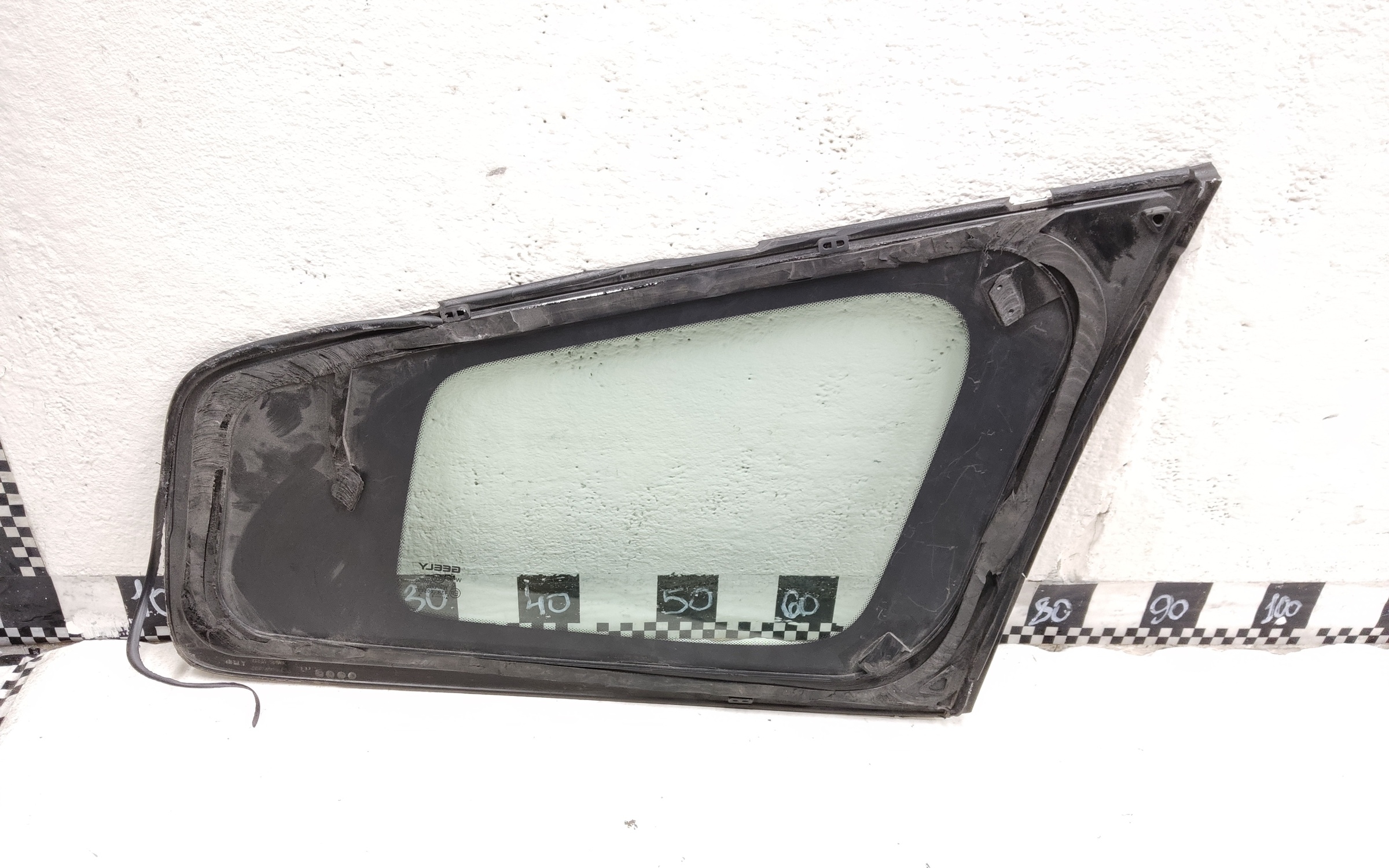 Стекло кузовное заднее левое Geely Okavango Restail