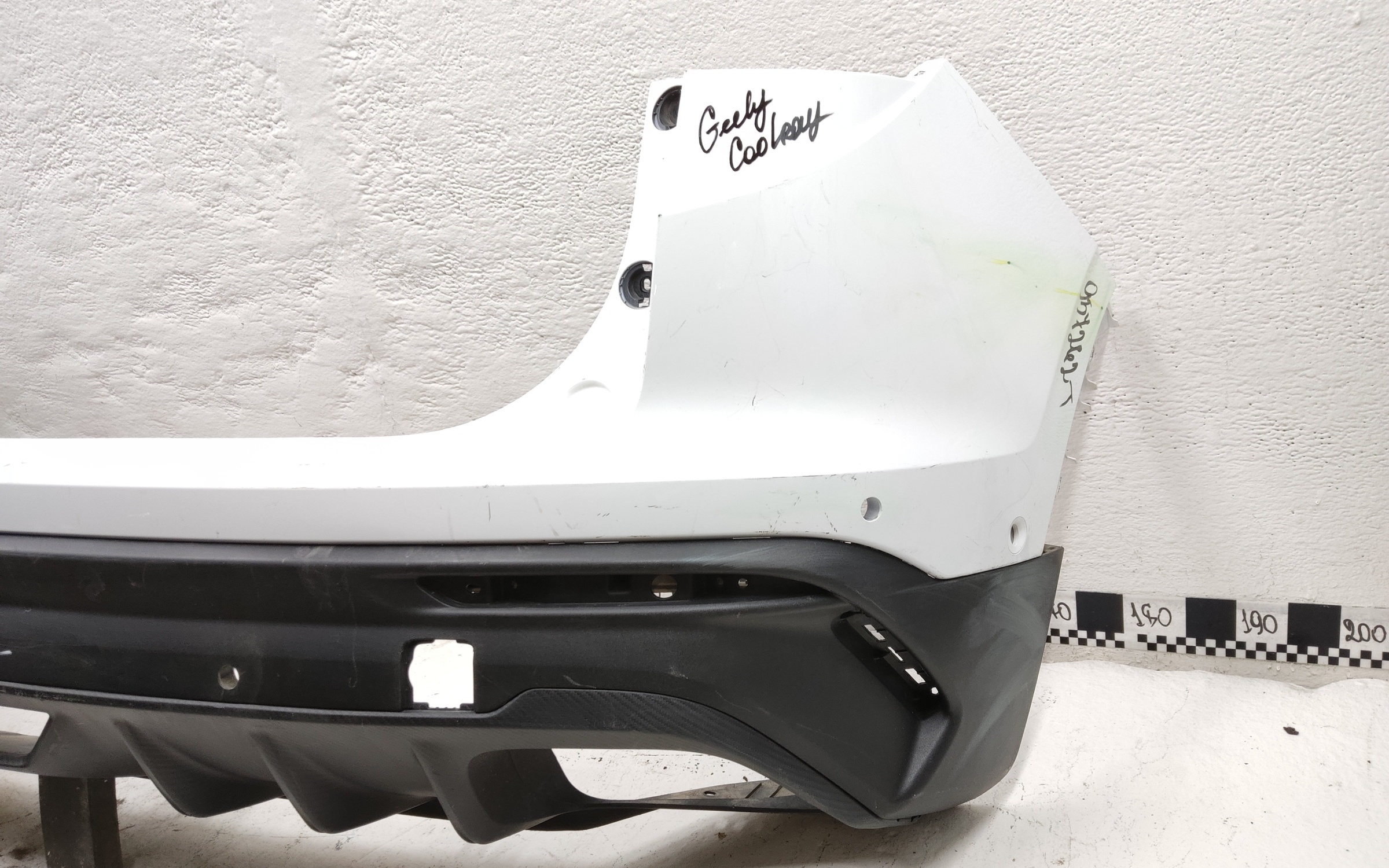 Бампер задний верхняя часть Geely Coolray