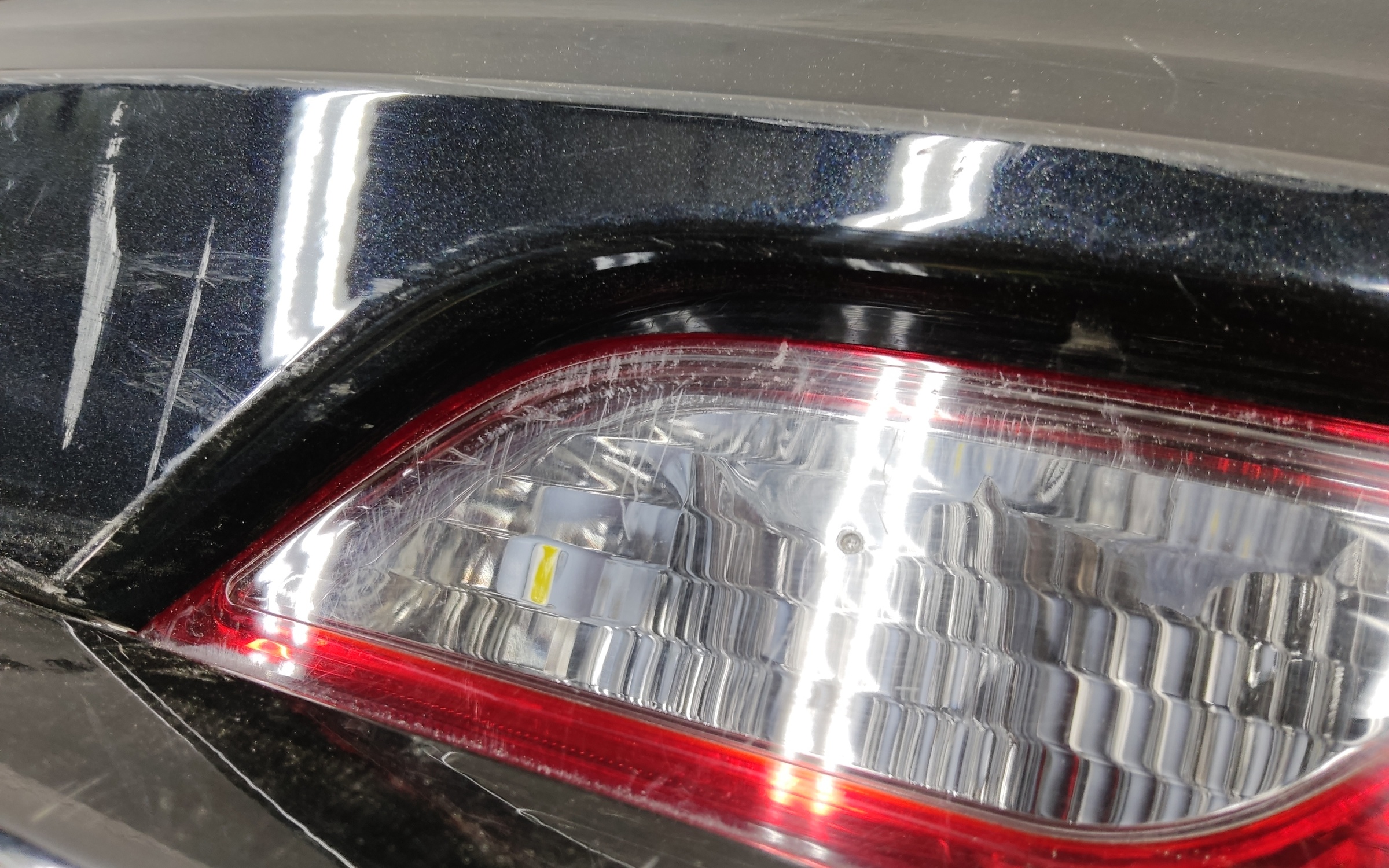 Бампер задний верхняя часть Geely Tugella