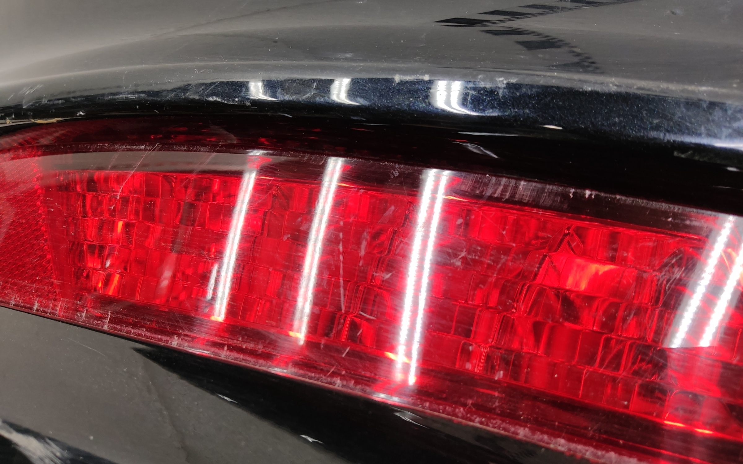 Бампер задний верхняя часть Geely Tugella