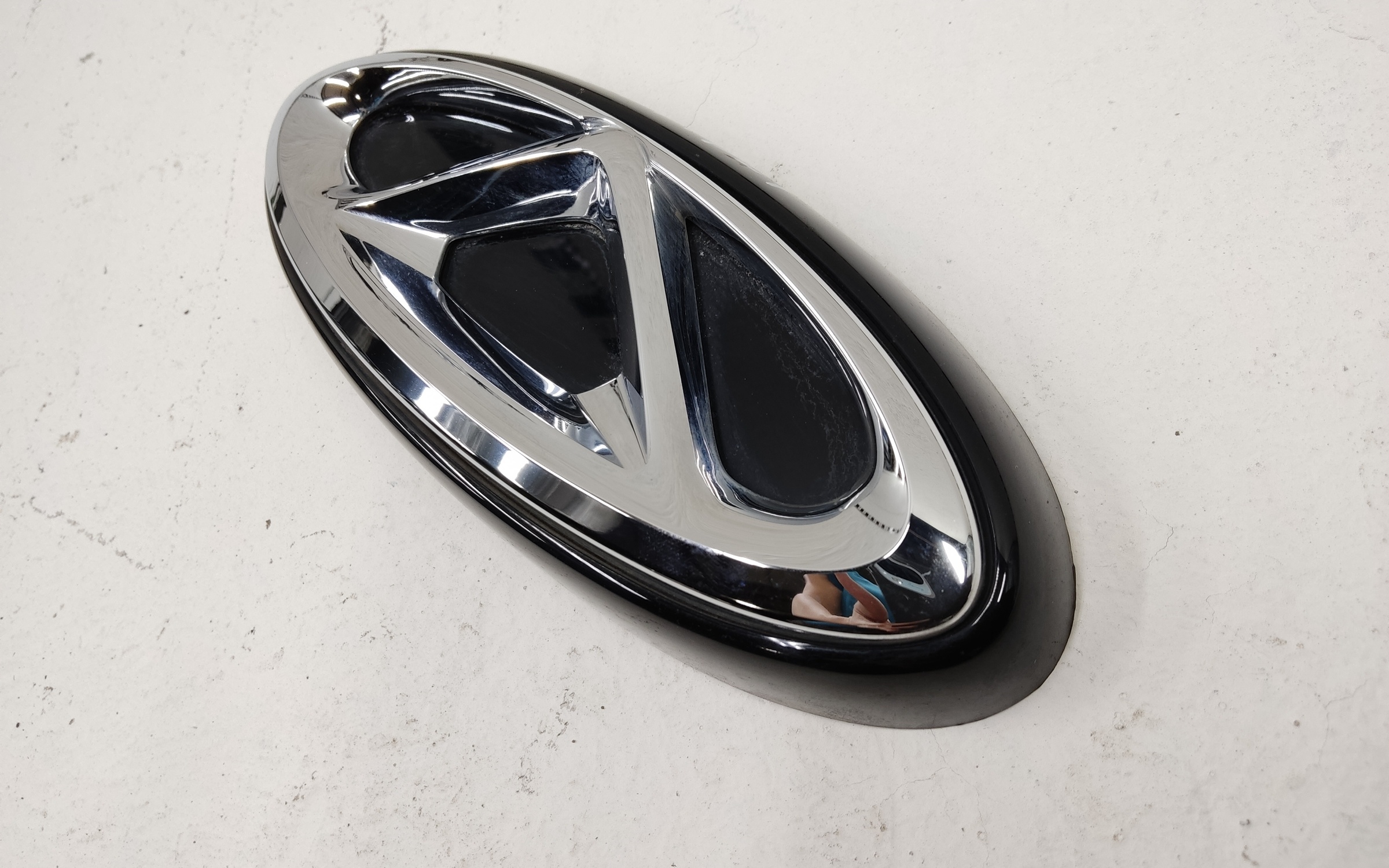 Эмблема крышки багажника Chery Tiggo 4