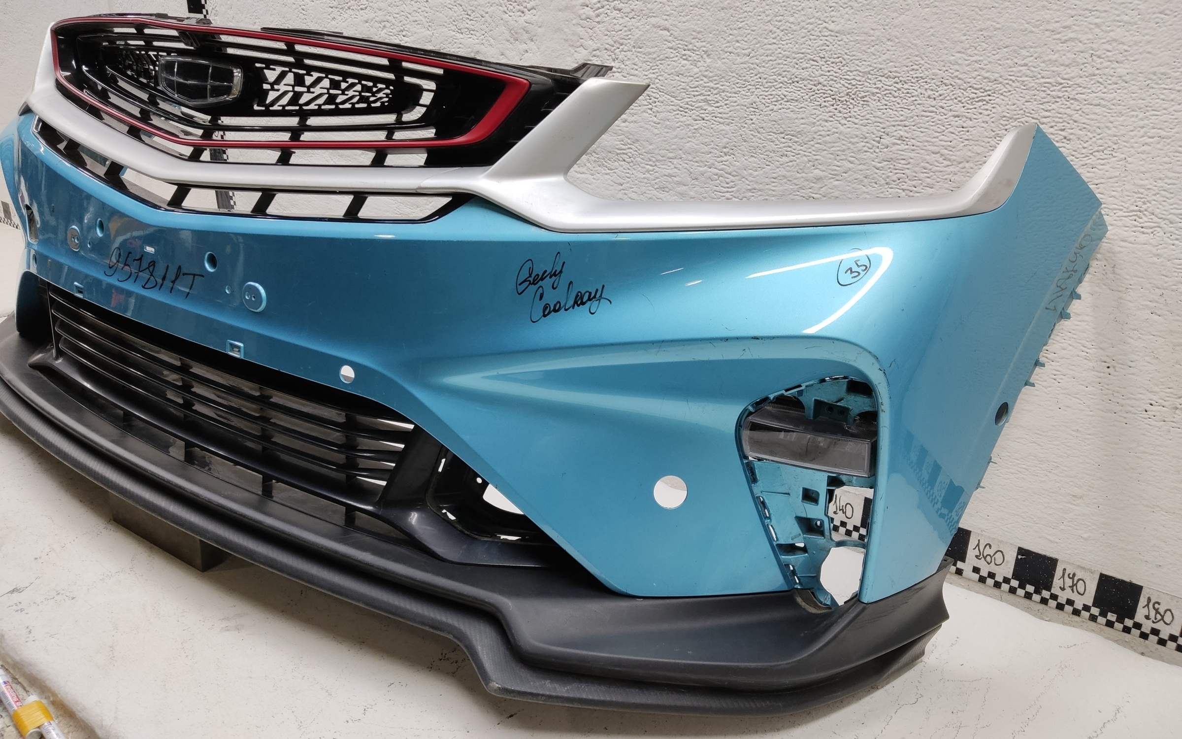 Бампер передний Geely Coolray под парктроник