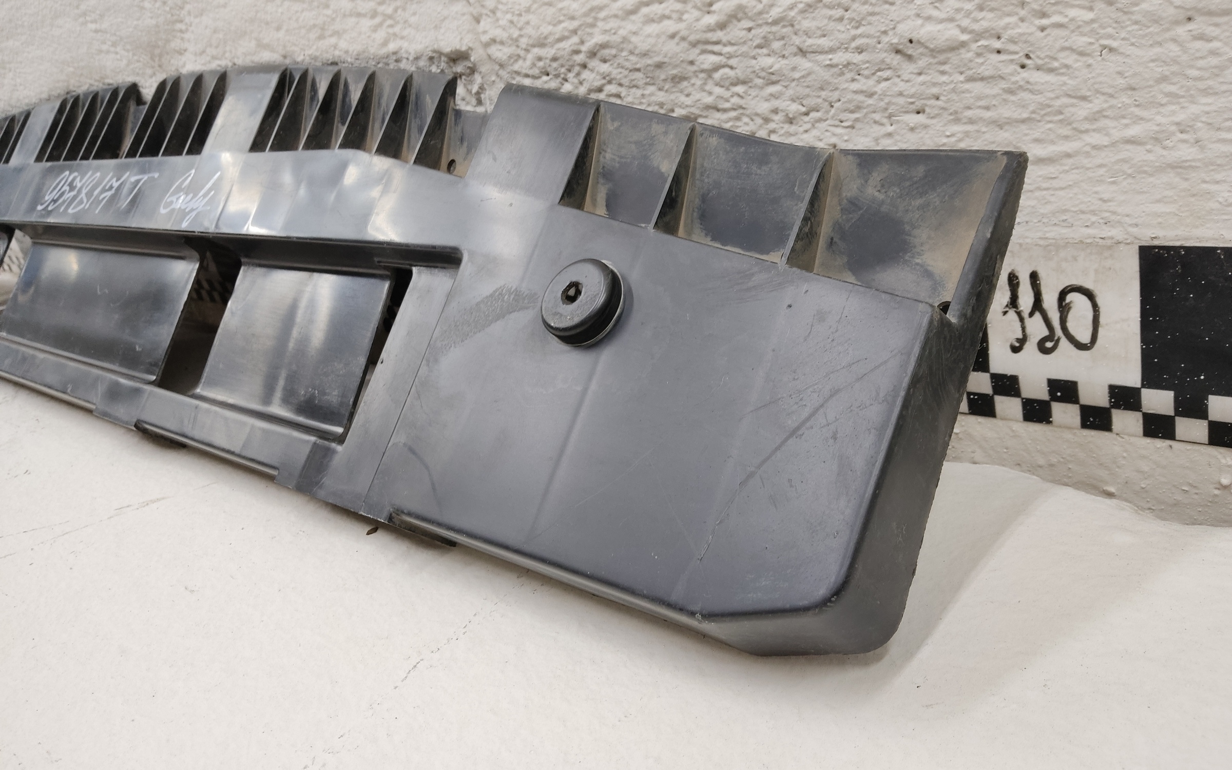 Пыльник переднего бампера Geely Coolray
