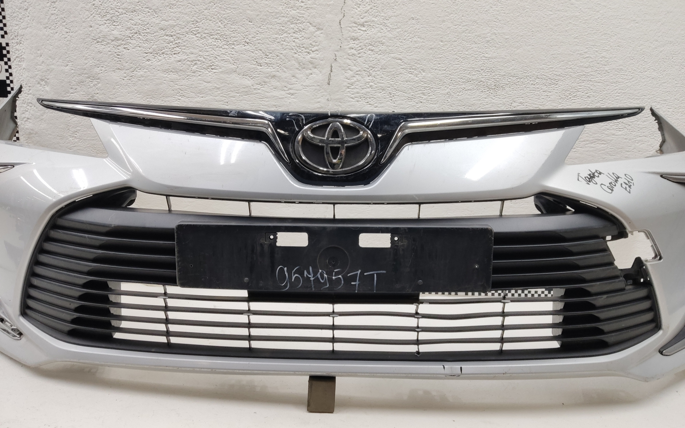Бампер передний Toyota Corolla Е210