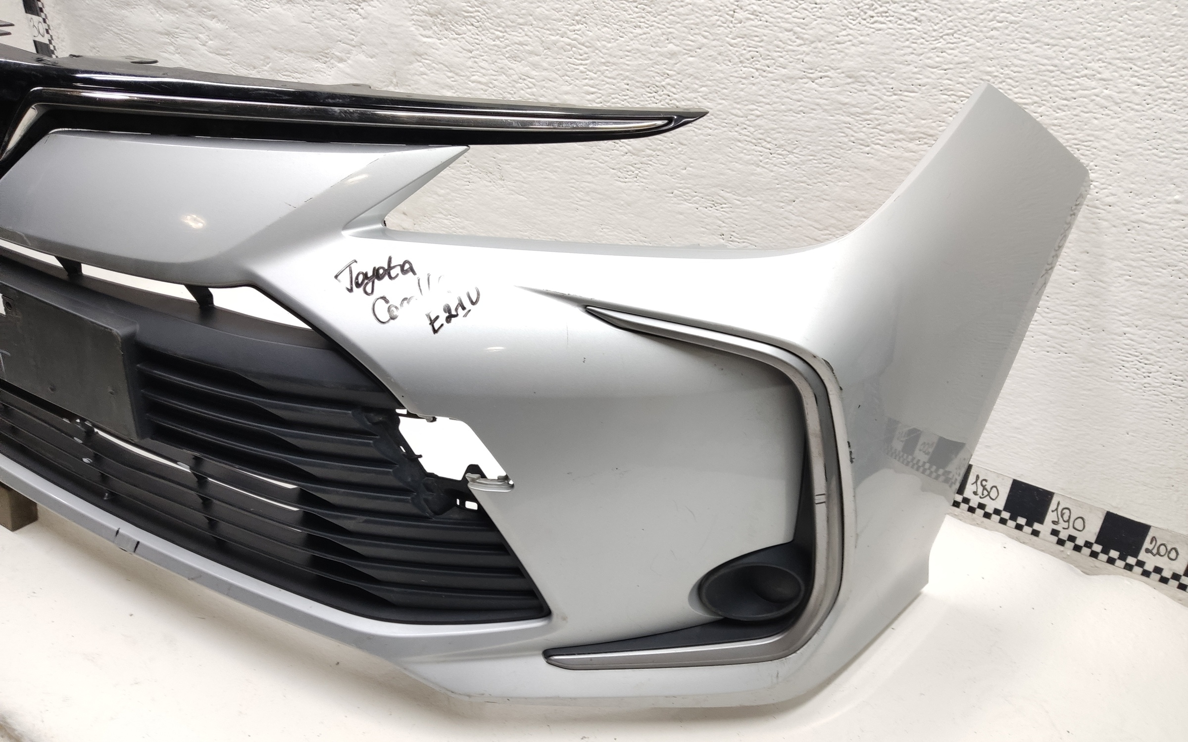 Бампер передний Toyota Corolla Е210