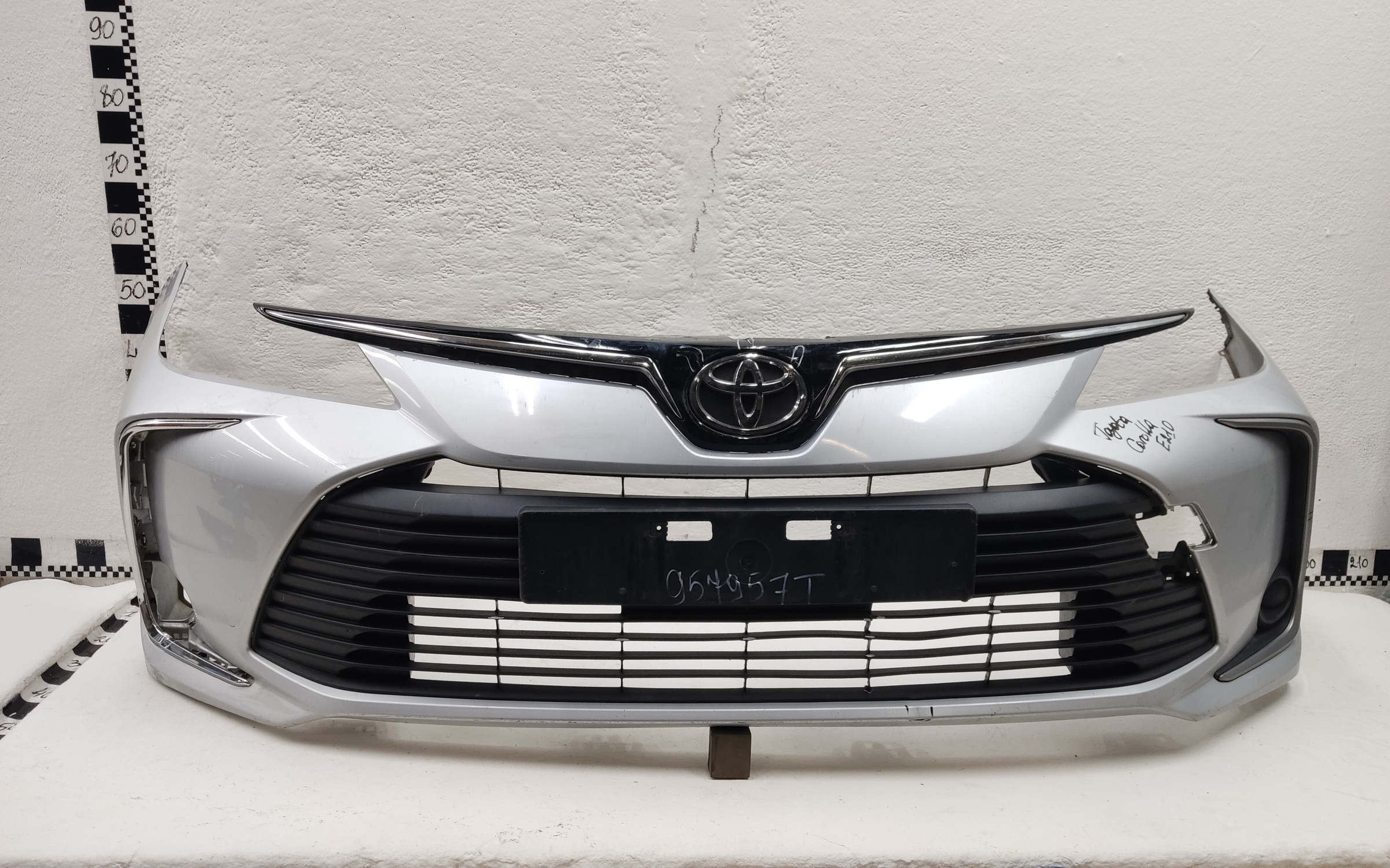 Бампер передний Toyota Corolla Е210