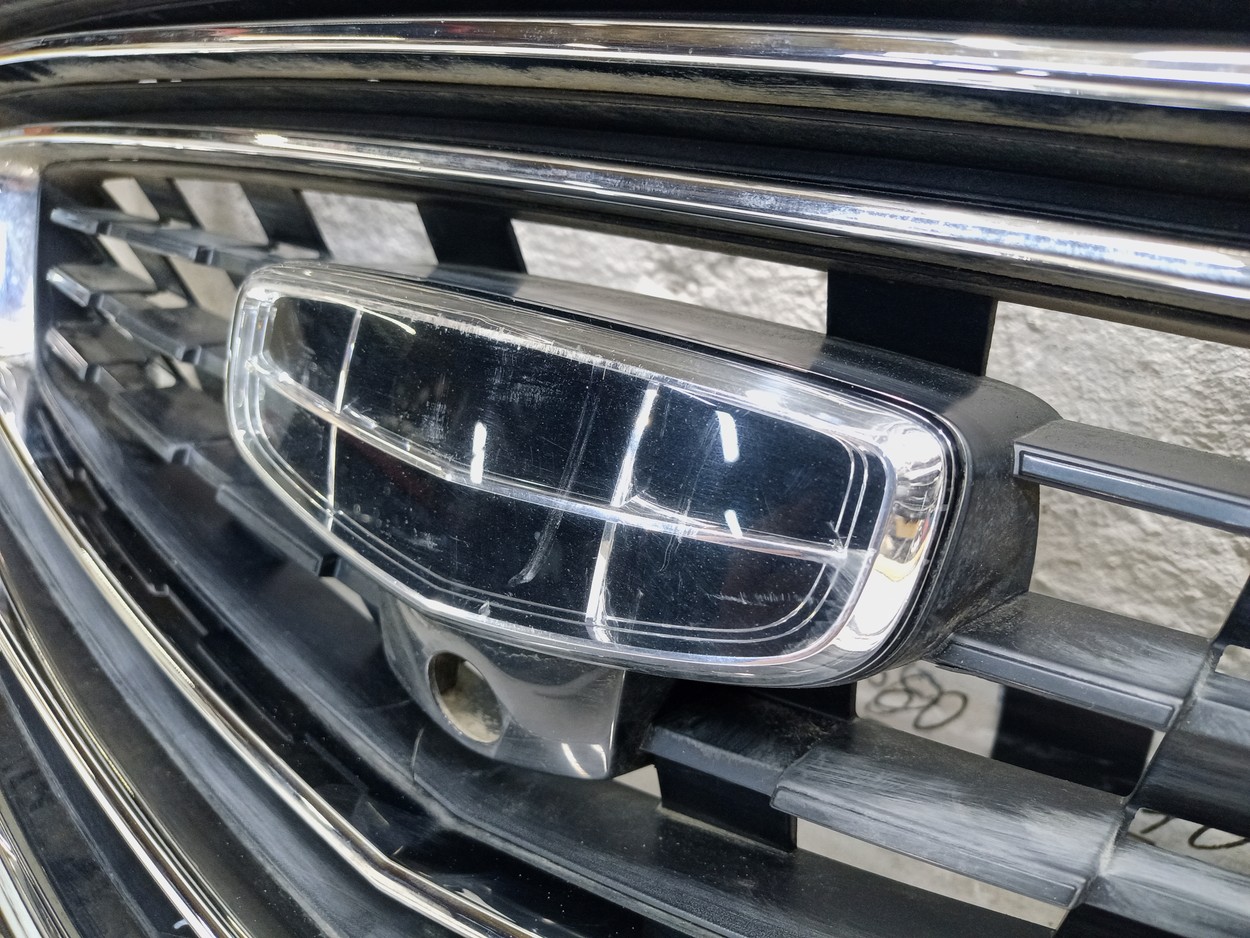 Решетка радиатора Geely Atlas Pro под камеру