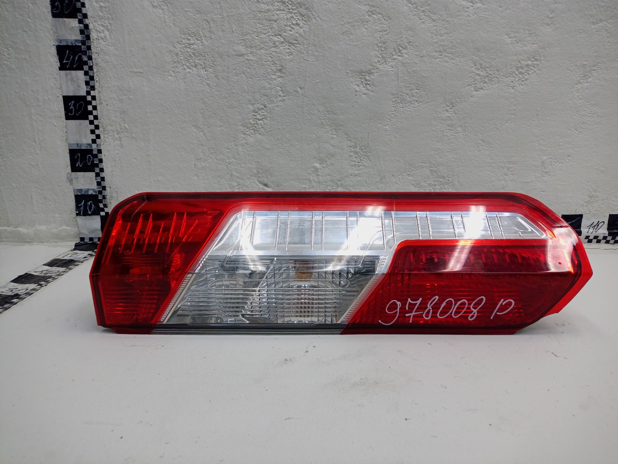 Фонарь задний левый наружный Ford Transit 7