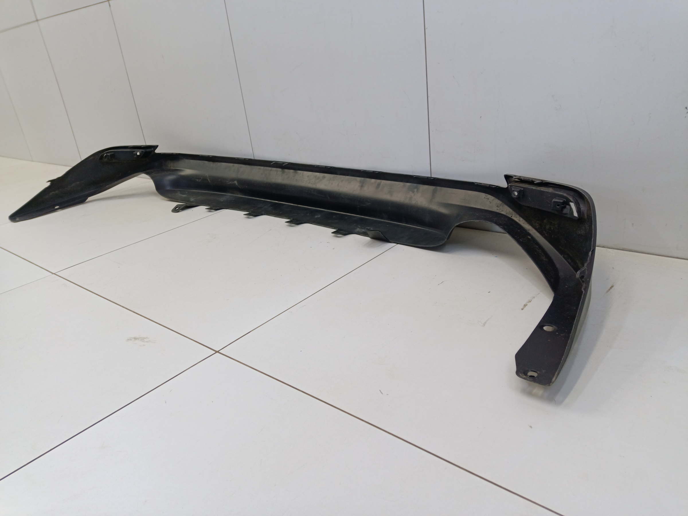 Юбка заднего бампера Toyota Camry V70