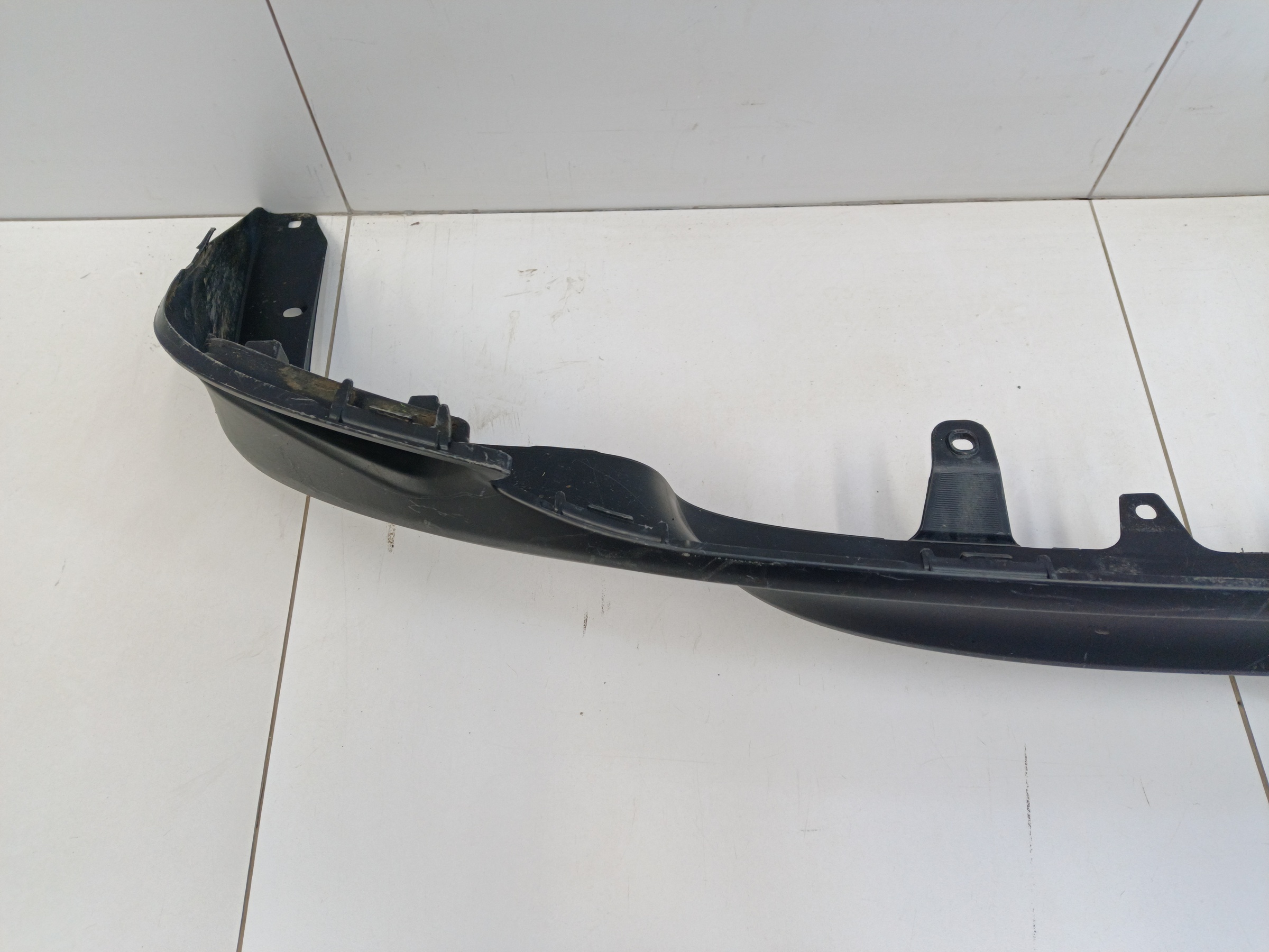 Юбка заднего бампера Toyota Camry V70