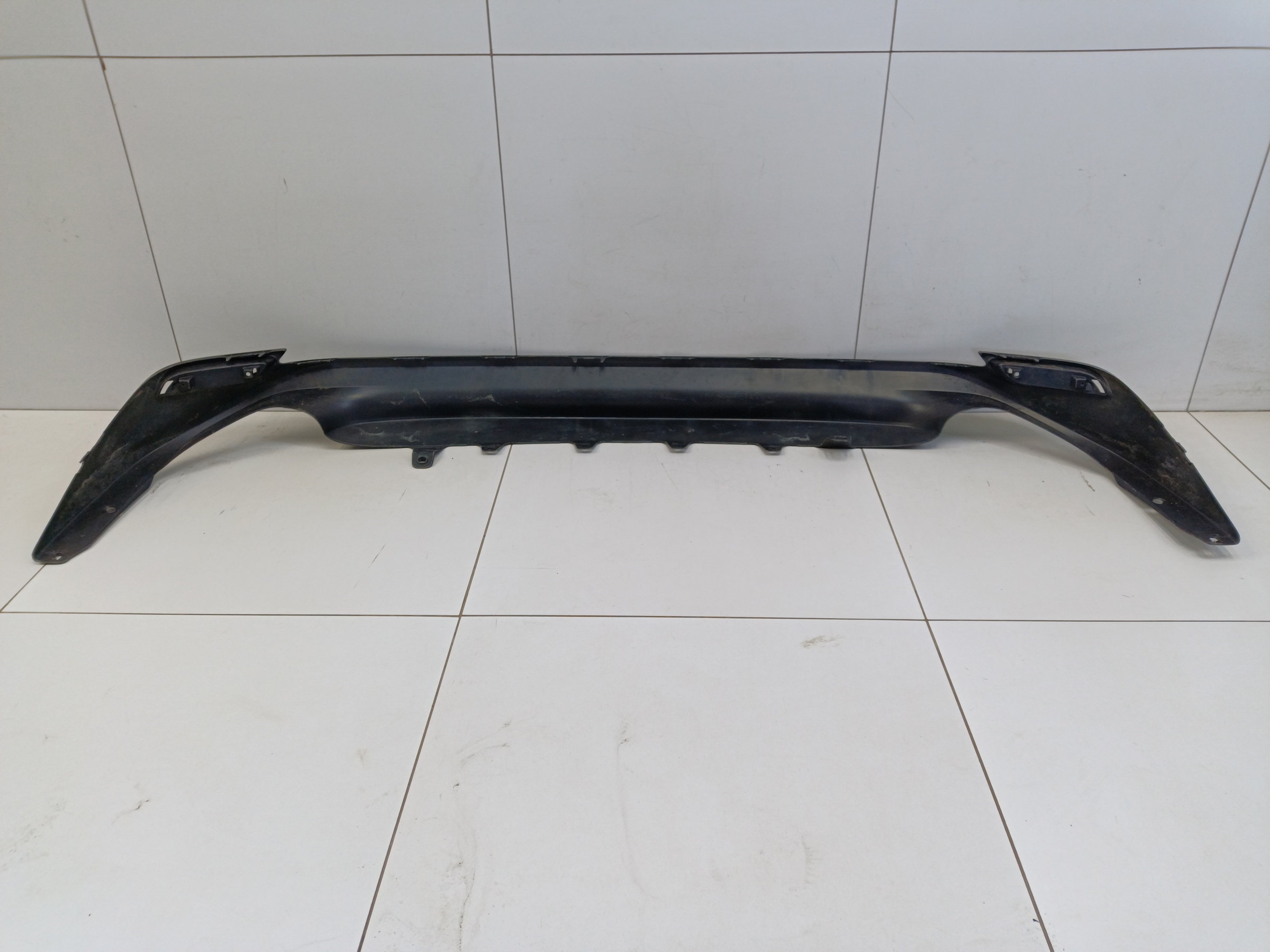 Юбка заднего бампера Toyota Camry V70