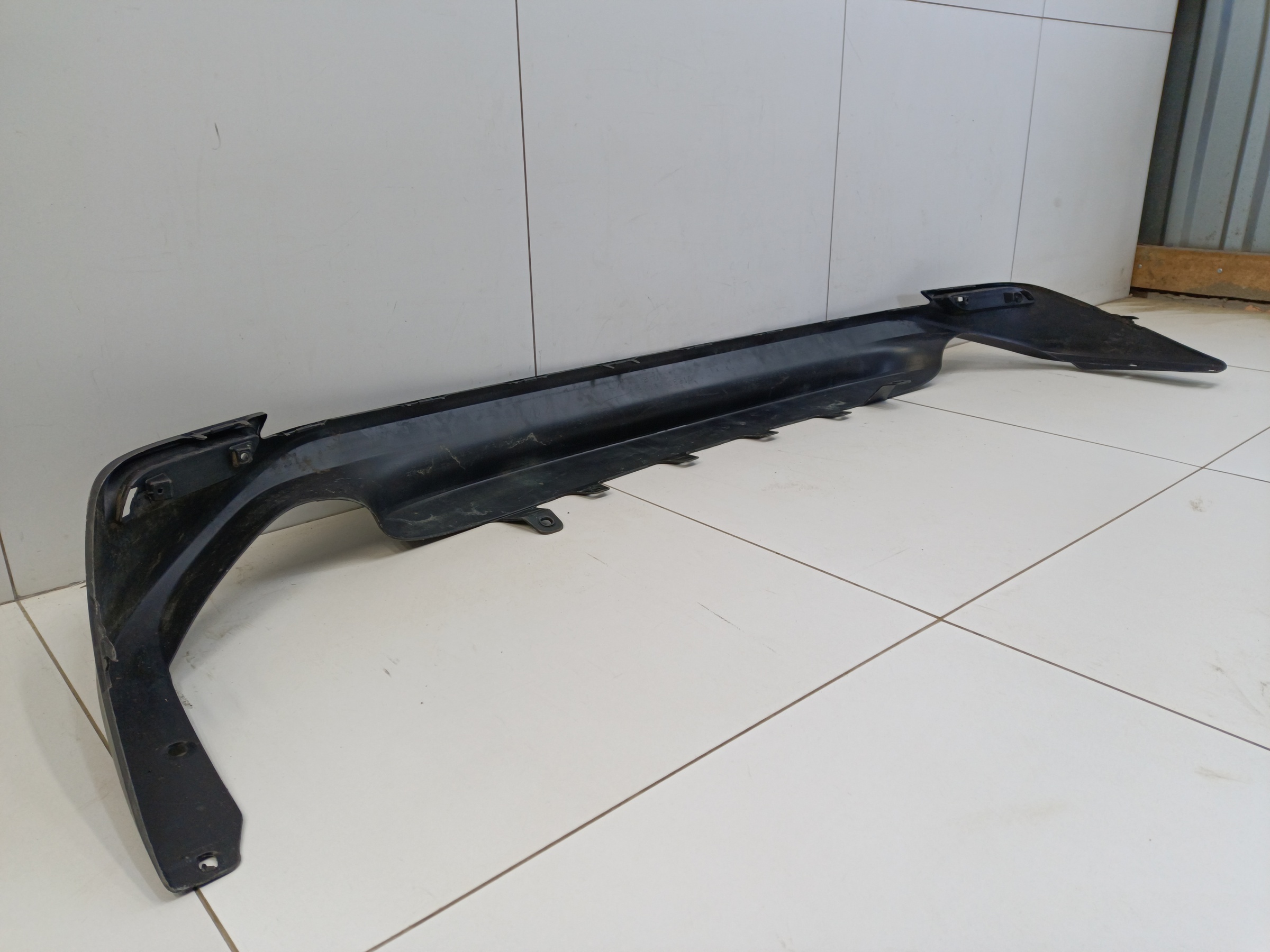 Юбка заднего бампера Toyota Camry V70