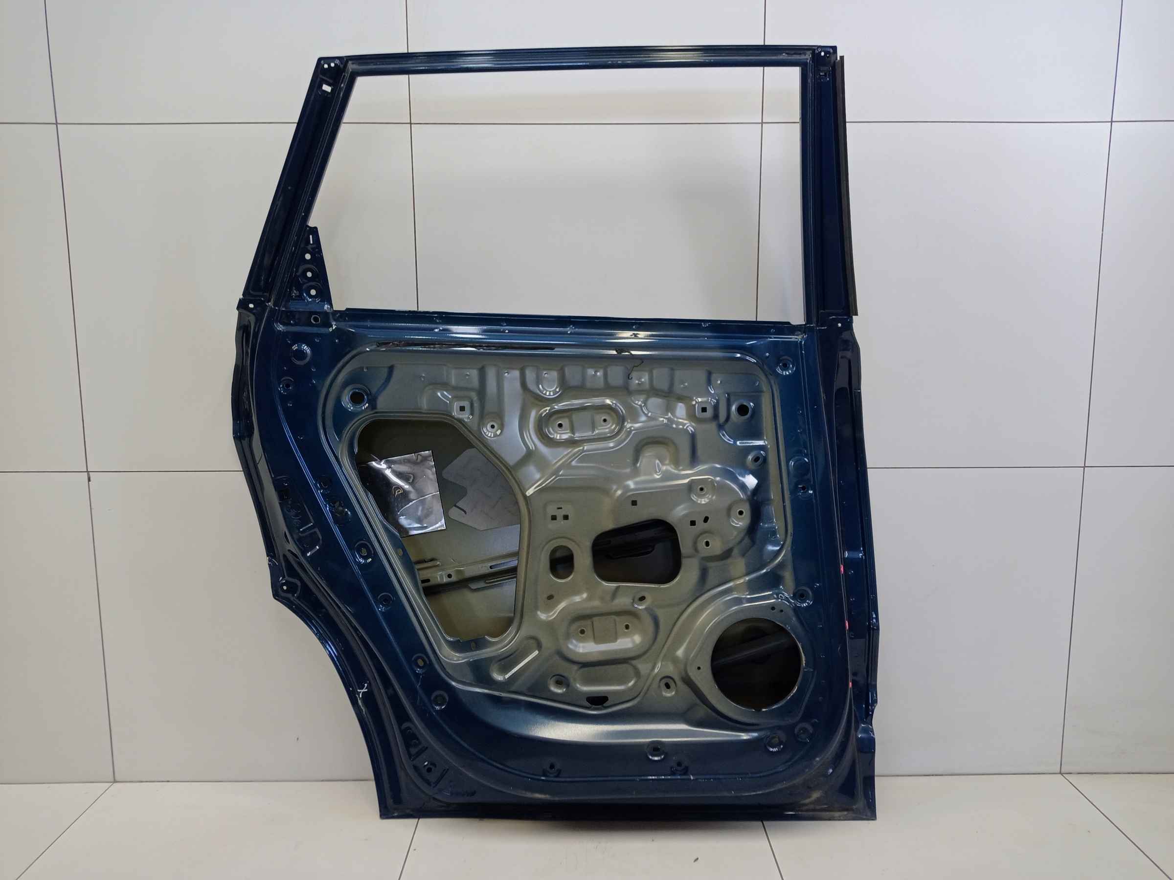 Дверь задняя левая Geely Okavango Restail
