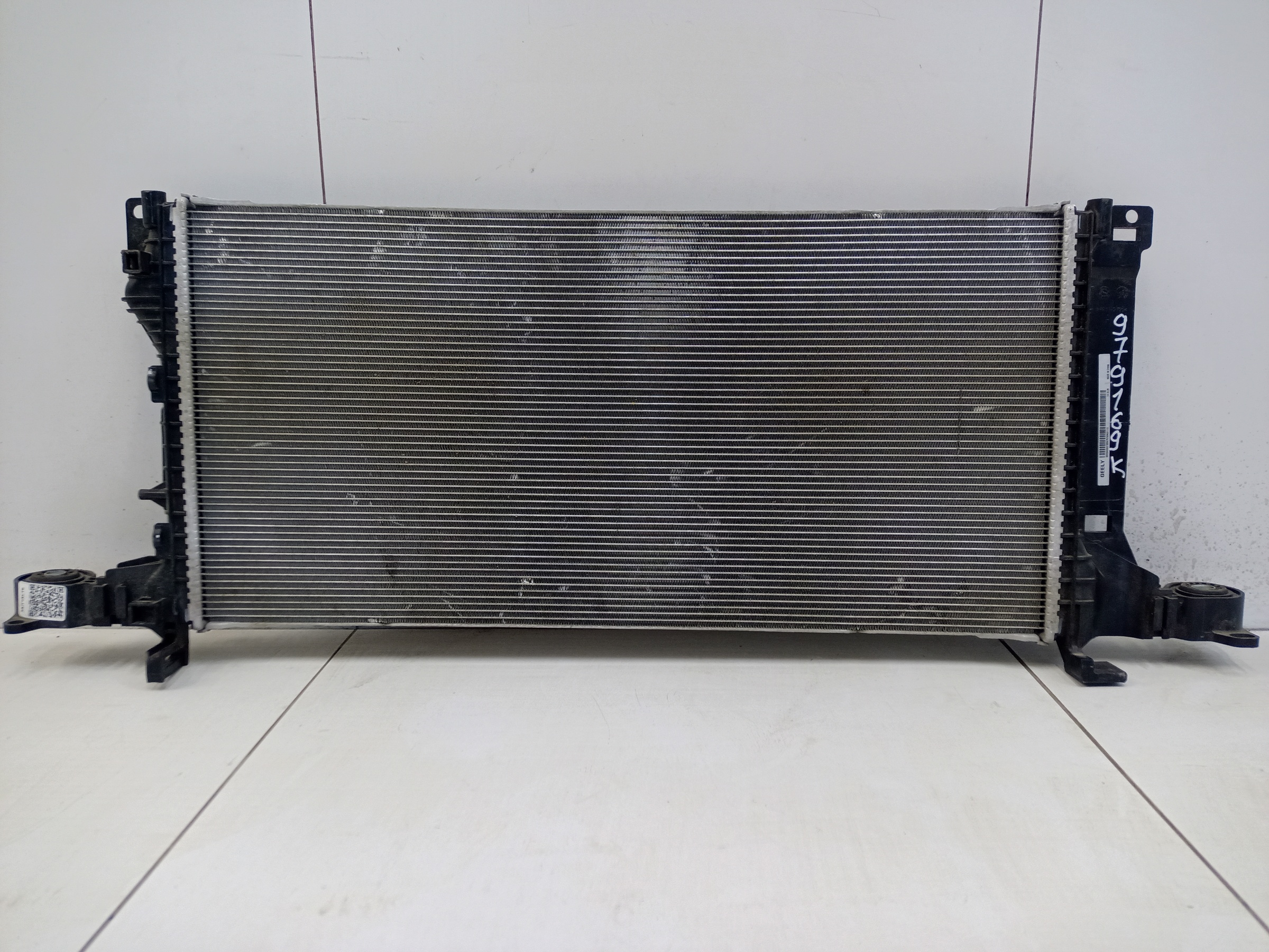 Радиатор охлаждения двигателя Geely Tugella