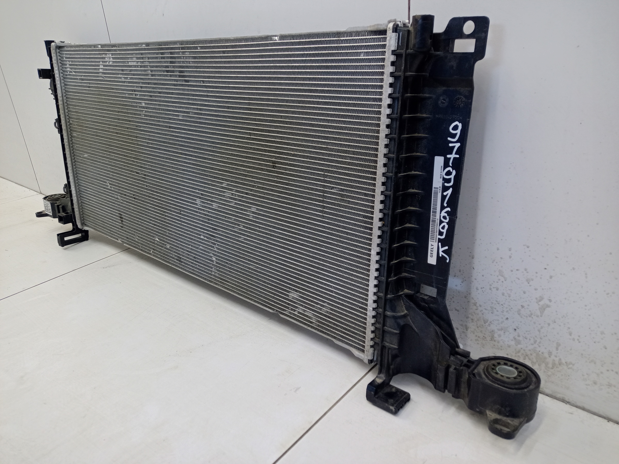 Радиатор охлаждения двигателя Geely Tugella